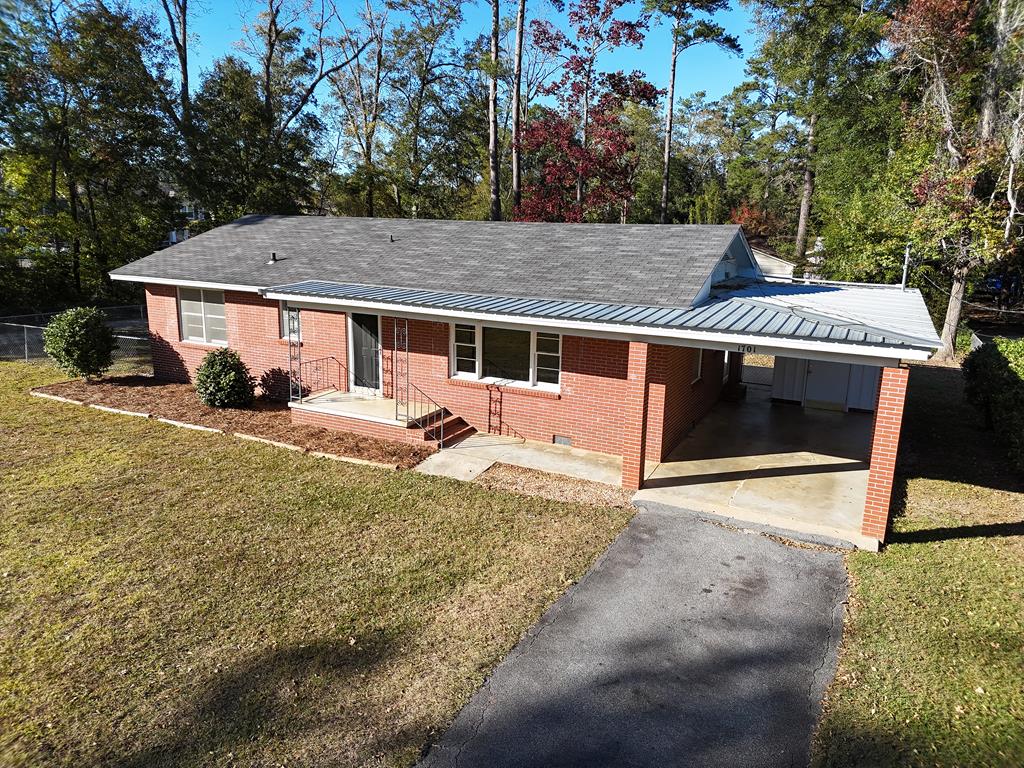 Take a look at this amazing BRICK HOME in the heart of Thomasville, GA! Close to downtown AND Publix, the location and great neighborhood make this a great find. The home features 3BR/1.5 bath, gorgeous hardwood floors throughout, and HUGE windows for plenty of natural light. You will love the big open living room and the great kitchen. Outside, enjoy the massive fenced backyard with patio and outbuildings, great carport and enclosed laundry room. Call your favorite Realtor TODAY for a closer look at this amazing property.