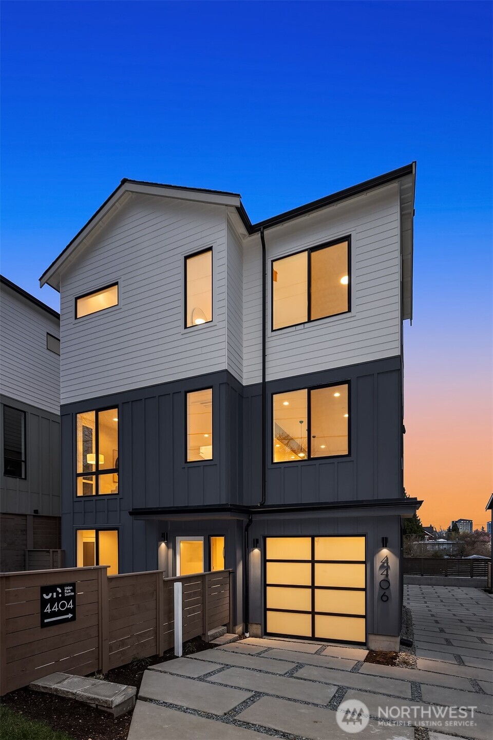 Ashworth Homes presents Union Park, a distinctive new community nestled in the heart of historic Wallingford. This spacious floor plan lives large! Entry level includes bedroom, flex bonus room, plus office and full bath - ideal for separate work & living areas for the whole household. Heart of the home on the second level includes stunning kitchen, living & dining + powder bath. Top floor hosts 3 beds, including primary suite with large closet and elegant bath. See the spectacular panorama from your rooftop deck! Blocks to extensive dining, coffee & boutiques. Recreation abounds with proximity to Green Lake, Burke-Gilman Trail & Gasworks Park. Plus, moments to UW & Fremont tech & outdoor industry employers, with north-south corridor access for effortless Sound travel.