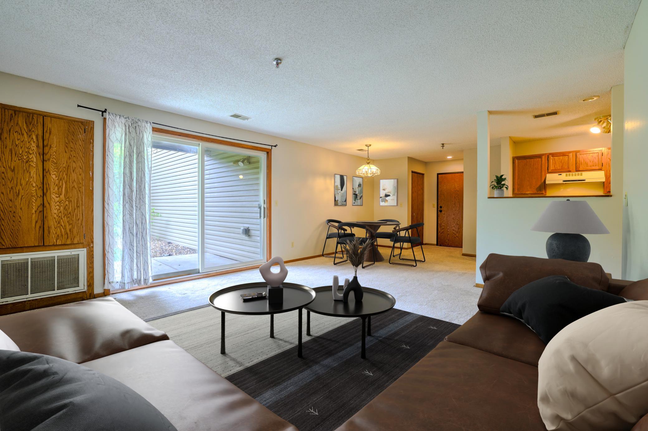 2-bedroom, 1-bath condo located in an ultra-convenient Maplewood location! Adjacent green space with walking trails. Easy access to bus line, Beaver Lake, Geranium Park, Hill Murray High School, 3M, I-94, and local shops/eats. Newer carpet throughout the unit, newer paint interior, walkout patio.  perfect opportunity to stop paying rent and start building equity. It offers incredible value with tons of space! Inside, you’ll find spacious bedrooms and a large living room,  move-in ready. Newer roof and siding. 1-car garage. The HOA fee is very reasonable, helping keep your monthly payment affordable. Check this one out! You will not be disappointed.