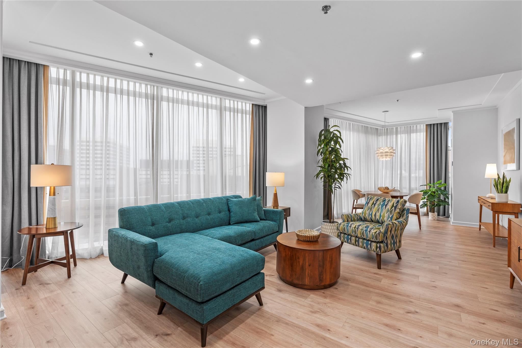 Rare Investment & Living Opportunity at The Ritz-Carlton Residences, White Plains

This move-in-ready, fully renovated unit at The Ritz-Carlton Residences offers a unique opportunity to own one of the few apartments in the building that allows shorter-term lease rentals—from three months up to one year. Whether you're seeking a luxury primary residence, a part-time pied-a-terse, or a flexible income-generating investment, this property offers outstanding versatility.

Professionally designed and meticulously maintained, the home features beautiful new hardwood floors, high ceilings, and an abundance of natural light. The kitchen offers both style and functionality, while spacious walk-in closets and a brand-new in-unit washer/dryer provide added convenience. Offered fully furnished at additional cost —including all designer furniture shown in the listing photos (no virtual staging)—this is a true turnkey opportunity. High-end details such as hotel-quality mattresses, premium linens, and plush towels further elevate the living experience.

Residents enjoy access to world-class Ritz-Carlton amenities: 24-hour doorman and concierge, two state-of-the-art fitness centers, indoor pool, spa, salon, resident lounge, conference room, and elegant outdoor terraces. Optional services include laundry and daily housekeeping. On-site parking is also available.

Located in the heart of downtown White Plains, you're just steps from award-winning dining, luxury shopping, and the Metro-North station—with complimentary shuttle service included. All this, just 35 minutes from Manhattan.

Whether you're looking for a refined residence or a high-end investment with built-in rental flexibility, this exceptional property delivers on every front.