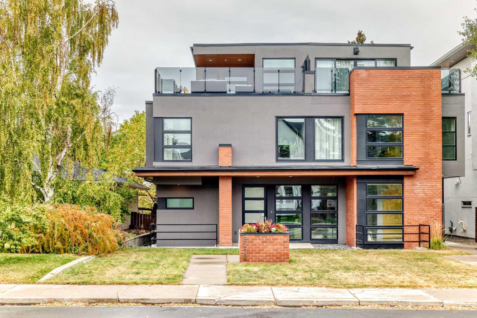 This contemporary, fully developed Inner City Home is loaded with upgrades thru-out and offers over 3200 SqFt of luxury living space complimented with a quiet location and city and mountain views from the Rooftop Patios. With 9 Foot Ceilings on the Main, central A/C and radiant in-floor heating in the Lower Level and all Bathrooms, the open concept floor plan starts with the bright Entry leading to the fully equipped gourmet Kitchen ideal for entertaining, complete with a 10 ft island with built-in wine rack, granite countertops, high-end stainless steel appliances including the gas down-draft cook top and built-in wall ovens, wine fridge and walk in pantry. The Dining area sits in front of a large floor to ceiling window, the Living Room features accent windows and a cozy gas fireplace with access to the backyard and there is the 2pce Guest Bath. The open riser staircase with glass panel wall leads up to the 2nd Level where you’ll find the massive Primary Bedroom offering a 5Pce Ensuite with walk-in shower and Air-Jet corner soaker tub plus, the 15’ walk-in closet with custom California Closet wood built-ins. There is also the 2nd Bedroom with it’s own 4Pce Ensuite, the Den/Flex area and Laundry Room. The Top Level has a 3rd Bedroom complete with a 3Pce Ensuite that can also be used as a Home Gym, Office or a Bonus Room with access to both Rooftop Patios which features stamped concrete with smoked glass panel rails (rails can be pushed out to make a full wrap around patio). The Lower Level is fully developed with a large Media/Family Room, the 4th Bedroom, another Full Bath and a Storage Room. Outside, you’ll find your private backyard oasis ideal for entertaining and the fully finished double detached Garage that’s roughed in for a heater.