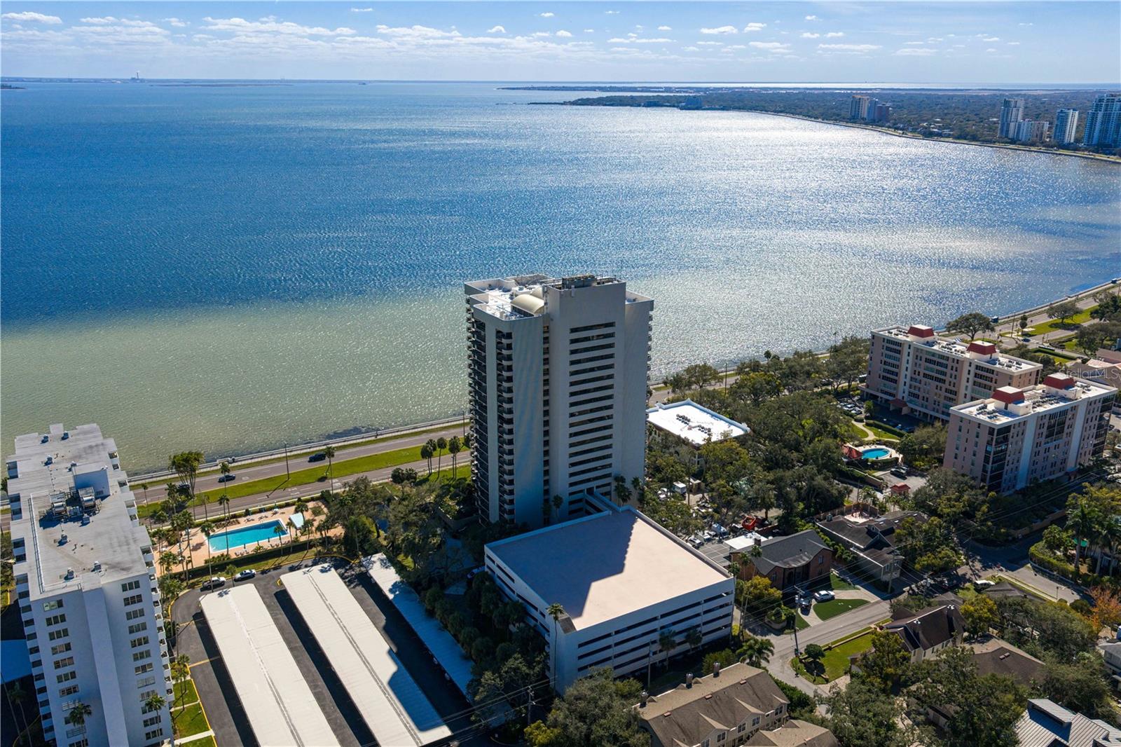Want incredible views of Bayshore and Downtown Tampa? Welcome to this waterfrontresidence at The Atrium, where expansive balcony space and light-filled interiors createan exceptional setting for bayfront living. Generous living spaces flow seamlessly onto awraparound terrace, extending everyday living and entertaining outdoors whilecapturing scenic Bay views from morning through sunset. The well-appointed kitchenoffers abundant cabinetry, stainless steel appliances, and direct balconyaccess—perfect for effortless al fresco dining. An open office area provides a dedicatedspace for working from home, while the spacious primary suite offers terrace accessand beautiful Bay views. The updated primary bath features dual vanities and a walk-inshower, complemented by a walk-in closet designed to maximize storage andfunctionality. A private hallway leads to the well-sized second bedroom and adjacentupdated bath, creating a comfortable and inviting retreat for guests. In-residencelaundry has been thoughtfully enhanced with a full-size washer and dryer plus additionalwell-organized storage. For added peace of mind, IMPACT-rated sliding doors andwindows provide enhanced protection during hurricane season while also offeringimproved sound reduction year-round. The Atrium delivers a resort-inspired lifestyle with24-hour staffing and security, on-site management, a heated bayfront pool and spa,tennis courts, a full fitness center, and a quiet library for relaxation. Ideally positionedalong iconic Bayshore Boulevard, this residence puts you moments from HowardAvenue and Hyde Park’s celebrated dining, shopping, and nightlife. Downtown Tampa,Tampa General Hospital, Tampa International Airport, major retail destinations, and theGulf beaches are all within easy reach. Experience elevated bayfront living in one ofTampa’s most desirable high-rise communities. Your private showing awaits.