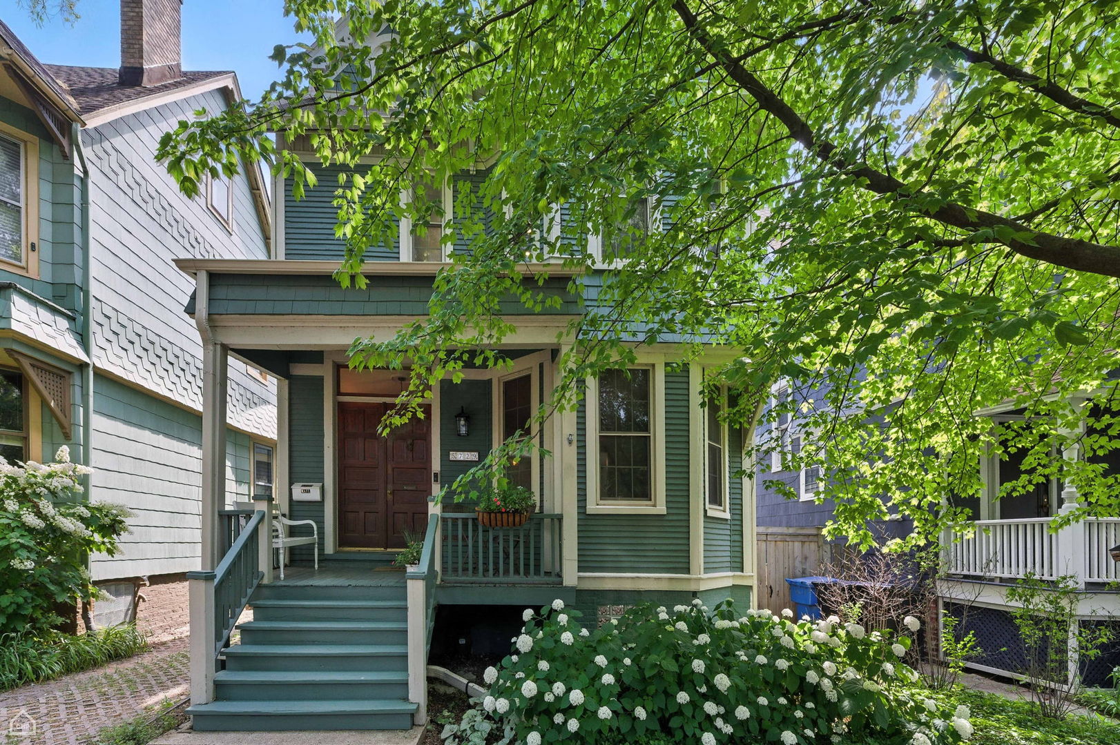 A special home on Harper in move-in condition with garage parking!  This thoughtfully redesigned Victorian home is perfectly situated on one of Hyde Park's most popular and charming blocks. Highly upgraded by the current owners, the resulting 5-bedroom, 3.5-bath home retains an abundance of historic vintage detail (high ceilings, hardwood floors), plus numerous modern upgrades, including central a/c, new baths and kitchen, and a wonderfully finished basement. The newly-redesigned open kitchen comes with hardwood cabinets, stone counters, a professional grade stove and hood, and a separate breakfast area.  The basement has been recently completely renovated to include a TV/gaming area, an additional bedroom (perfect for guests and/or teens), and a modern full bath.  Spacious deck off the dining room overlooks the deep, grassy backyard.  Easy walking distance to downtown transportation, the shops on 57th Street, the University of Chicago campus, and both Lab School locations.