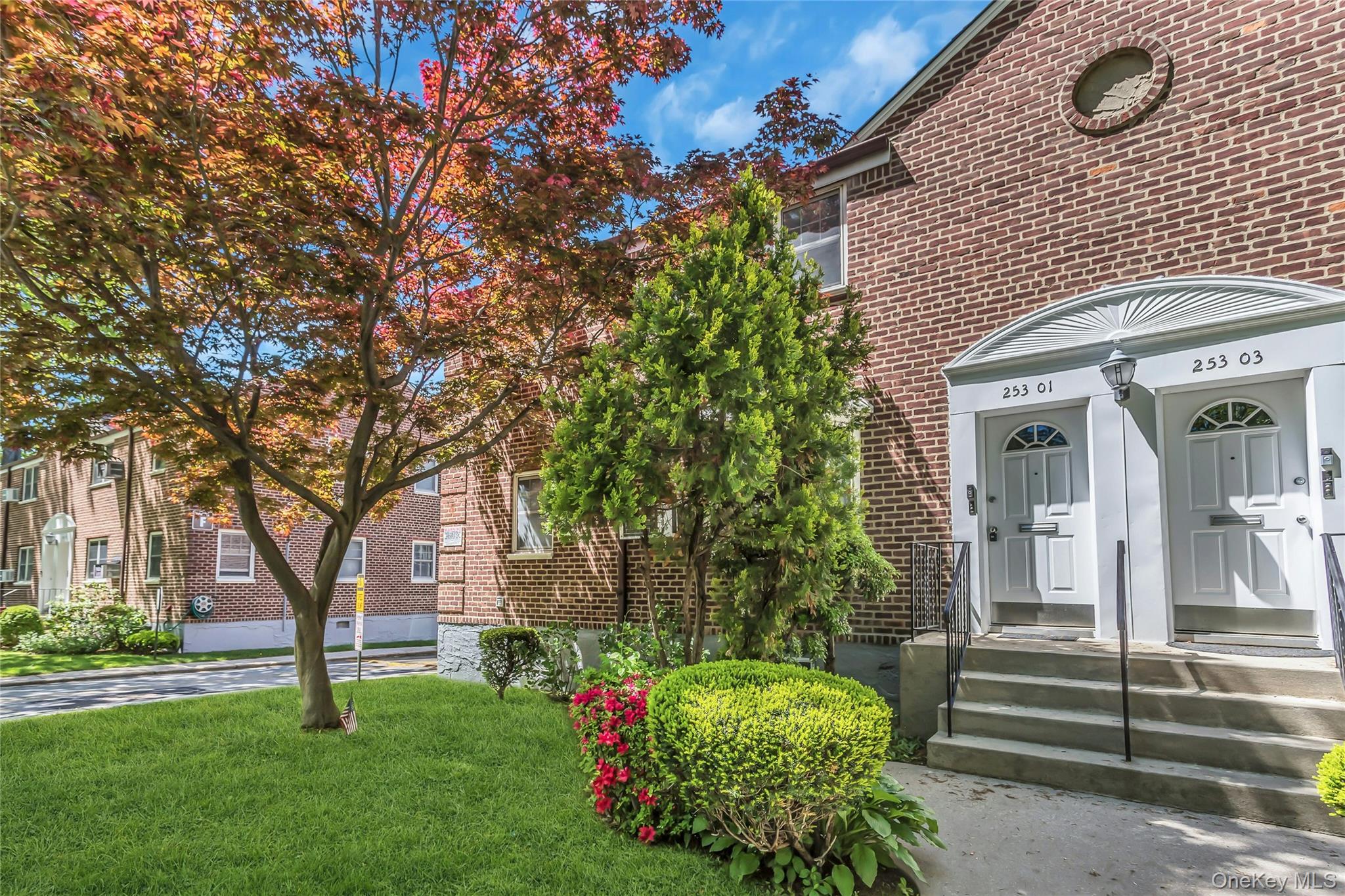 Welcome to Deepdale Gardens in Little Neck. This bright second-floor corner two bedroom co-op offers a comfortable layout, abundant natural light, and the added benefit of having no unit above. Windows in every room enhance the home’s open and airy feel, while its corner position provides additional privacy and sun exposure throughout. The home features recessed lighting, light wide-plank flooring, an open living and dining area, and an updated kitchen with high-gloss white cabinetry, gas cooking, built-in microwave, dishwasher, in-unit washer/dryer, tiled backsplash, and granite countertops. Additional highlights include wall A/C units, window treatments, full attic, outdoor playgrounds and gym. Maintenance includes utilities, property taxes, two parking spots, and private security. Conveniently located near the LIRR, major highways, shopping, schools, and parks. No flip tax. No subletting. 20% down required.