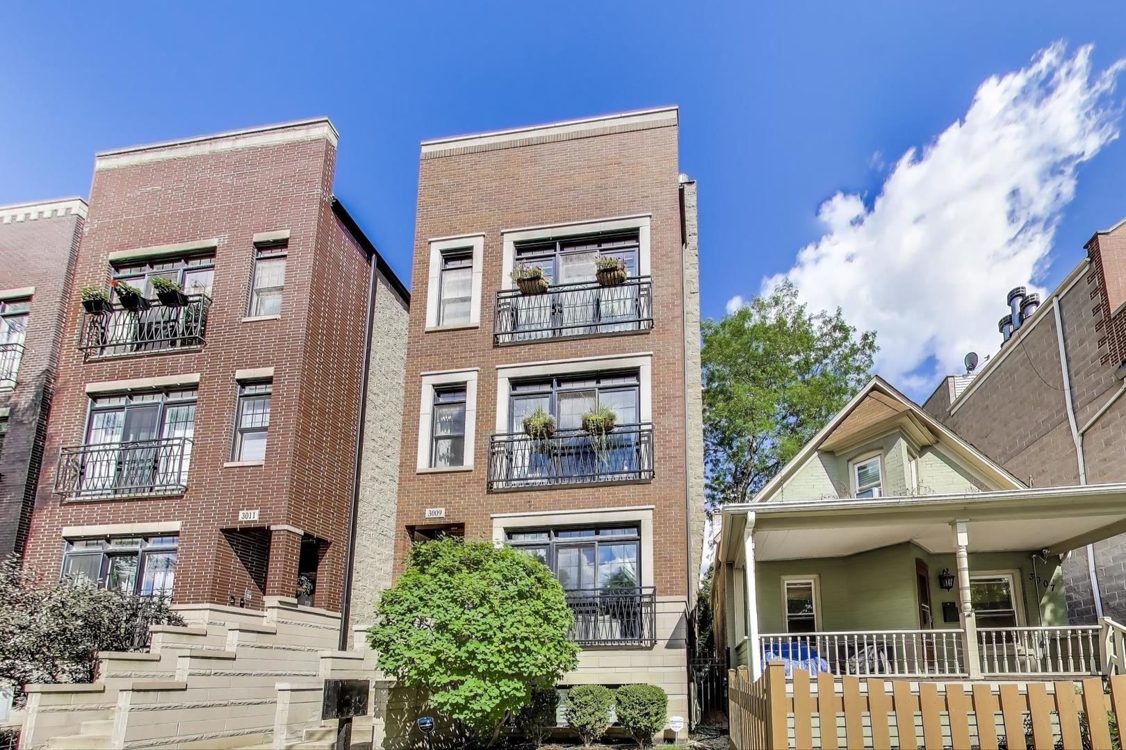 Don't miss this rarely available and beautifully updated 2 bed, 2 bath condo directly across from Hamlin Park in Roscoe Village! Enjoy peaceful, tree-lined views from your front windows, gorgeous sunsets, and quick access to the park's pool, field house, fitness center, playground, sports courts, dog park, and seasonal Roscoe Village Farmers Market-all just steps from your door. Inside, the bright and open-concept layout is designed for modern living. The updated kitchen features 42" cabinets, thick quartz countertops, classic subway tile backsplash, stainless steel appliances, and a large island with bar seating-perfect for cooking and entertaining. The sun-filled living room is anchored by a cozy wood-burning fireplace with gas starter and offers a built-in niche ideal for a home office or reading nook. The spacious primary suite includes a walk-in closet and an ensuite bath with dual vanity and jacuzzi tub. The second bedroom opens directly onto a private rear deck with Trex composite flooring-great for grilling, relaxing, or entertaining. Additional highlights include refurbished hardwood floors throughout, new designer lighting/hardware, pre-wired for surround sound, in-unit laundry, new bathroom floors, low monthly HOA dues, one dedicated garage parking space, and additional storage.