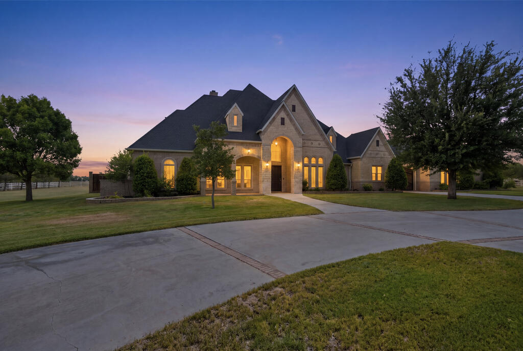 3215 Lantana Lane is an extraordinary estate situated on 2 private acres, an almost unheard-of luxury in town. Designed for elevated living and effortless entertaining, the home showcases soaring ceilings, dramatic exposed beams, and beautifully scaled living spaces. A private basement retreat features an entertainment lounge, an impressive bar, and a sauna. Outdoors, resort-style landscaping, a pool, and expansive covered living areas create a secluded oasis. Exceptional space, privacy and location converge in one remarkable Midland estate. Welcome Home!