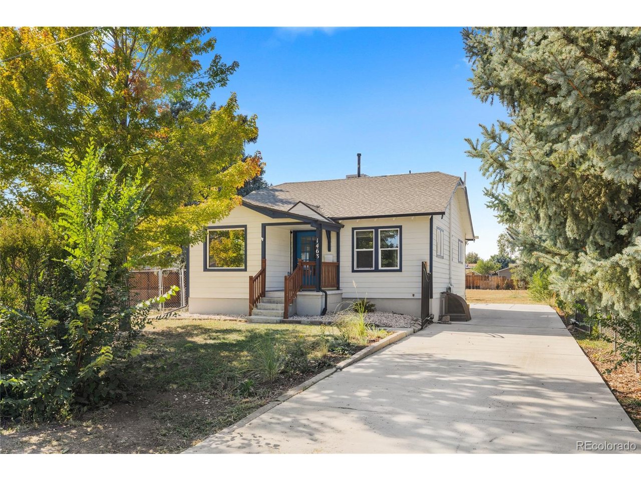 Welcome to this beautifully updated ranch-style home in Denver's Mar Lee neighborhood, offering 4 bedrooms, 2 bathrooms, 1,616 finished square feet, and an expansive 0.42-acre lot, a rare find within the city!Inside, natural light fills the inviting main level, featuring refinished hardwood floors and an open layout connecting the living, dining, and kitchen areas. The updated kitchen offers quartz countertops, modern cabinetry, stainless steel appliances, and tile finishes. Two bedrooms and a renovated bathroom complete the main level, while the fully finished basement adds two bedrooms, a second bathroom, and a spacious family room, ideal for guests, a home office, or additional living space.Extensive improvements completed in 2023 include newer windows, interior and exterior paint, furnace, water heater, roof, electrical panel, and plumbing, providing added peace of mind for the next owner.Step outside to discover what truly sets this property apart: over 18,000 square feet of land with room to make it your own. The expansive, flat backyard offers endless possibilities for entertaining, gardening, outdoor recreation, or future improvements.Enjoy convenient access to Garfield Lake Park, Sanderson Gulch Trail, Ruby Hill Park, and the shopping and dining at Belmar, along with easy connections to downtown Denver and surrounding areas.With major updates already completed and ample outdoor space, this move-in-ready home is one you'll want to experience in person!