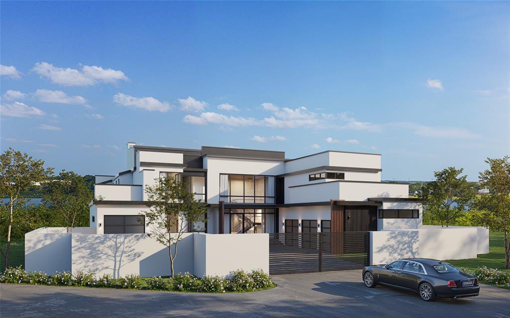 Perched on the water of Lake Lewisville, this masterpiece offers vast, protected water views from nearly every room across 4 inspired levels. Set on .65 acres behind a private gate at the end of a cul-de-sac within an exclusive 13 home enclave, the residence combines modern design, clean lines, and refined sophistication, creating the feeling you’re living in a work of art. The open concept main floor flows effortlessly between living and dining, anchored by a sleek chef’s kitchen with a hidden scullery. Multiple rooms feature collapsible glass doors that blur the line between indoors and out, perfect for entertaining or quiet evenings by the lake. The first floor primary suite captures mesmerizing sunset views over the water, while its spa inspired bath showcases organic stone, a soaking tub, and dual vanities. A 25 foot custom designer closet connects seamlessly to the main level laundry for effortless living. An additional guest suite and an executive glass walled study complete the main level, with the study offering a unique view into the show 2 car garage, a true gallery for automotive enthusiasts. Upstairs, discover a game room, theater, and 5 additional en suite bedrooms with treetop views. Surrounding the property, 40 acres of protected Corps of Engineers woodland ensure privacy and direct access to scenic hiking and biking trails. Outdoors, a designer pool and west-facing terrace invite you to savor breathtaking sunsets. If acreage is your desire, the adjacent .65 acre lot is also available exclusively for sale with this home, expanding your home lot to 1.25 acres, the largest in the neighborhood. The third floor includes a flexible living space or optional owners suite with an ensuite full bath, leading to a fourth-story “eagle’s nest” rooftop deck, offering the most commanding view of Lake Lewisville’s tranquil 28,000 acre expanse. This home is a rare blend of artistry, innovation, and waterfront serenity, crafted for those who demand the extraordinary