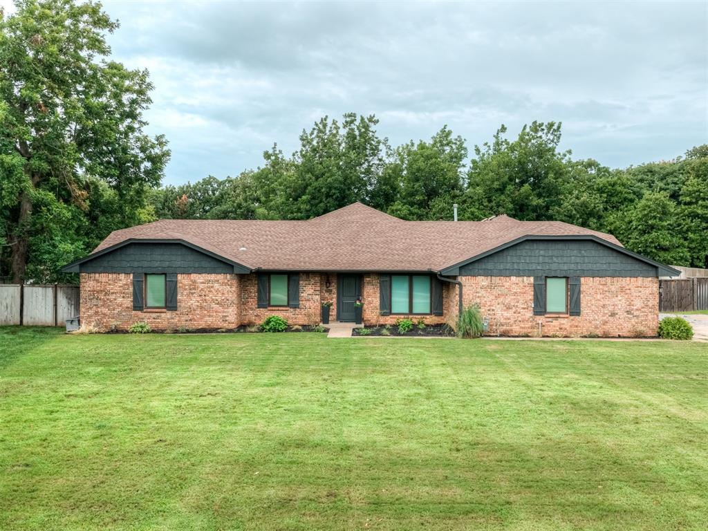 Rarely does a home combine nearly 5,000 square feet of one-level living, six bedroom suites, and nearly one acre in the heart of Edmond. Located directly across from Chisholm Elementary, this extensively remodeled custom home offers 4,882 square feet with 6 bedrooms, 5 full baths, and a powder bath—ideal for multi-generational living, entertaining, or simply enjoying exceptional space. Step inside to soaring cathedral ceilings, rich wood-look tile flooring, abundant natural light, and a stunning double-sided fireplace anchoring the open-concept living areas. The chef's kitchen features marble countertops, custom cabinetry, premium stainless appliances, a gas range, oversized farmhouse sink, and both formal and casual dining spaces. The luxurious primary suite offers a spa-inspired bath with an oversized walk-in shower, jetted soaking tub, dual vanities, expansive walk-in closet, and its own washer and dryer. Every secondary bedroom has direct bathroom access, including a private guest suite and Jack-and-Jill bathrooms. A dedicated office, spacious game room, and professionally soundproofed flex room with its own half bath provide endless possibilities for a studio, media room, gym, or executive office. Outside, the expansive lodge-style covered patio overlooks the beautifully terraced backyard, creating an incredible space for year-round entertaining. Additional features include three-zone HVAC, two water heaters, RV parking with a 50-amp hookup, generator wiring, Pella windows, and backyard irrigation supplied by a private well. Optional neighborhood pool and tennis amenities complete this exceptional Edmond property. Exterior trim freshly painted and landscaped. New exterior pictures coming soon!