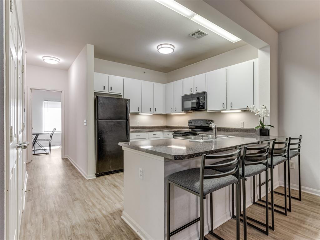 Welcome Home! This beautifully updated, furnished, 4 bedroom condominium is an ideal investor opportunity at The Edge at Norman Condominiums. Each bedroom boasts an en suite bathroom for personal space and a spacious walk-in closet. Freshly painted and fully updated to include updated appliances, flooring, kitchen hardware, kitchen and bathroom faucets, and washer and dryer in 2022, and a recently updated HVAC (7/2025). The complex offers basketball, pool, hot tub, and recreation facility for many of your leisure activities.  Close to the OU campus, the property is ideal for Saturdays in the fall!