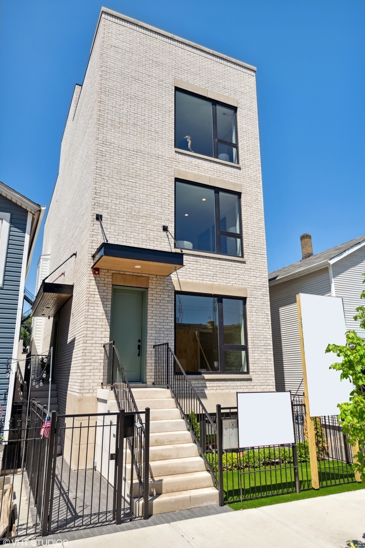 This LUXURY BRICK AND LIMESTONE NEWER CONSTRUCTION Duplex-Up has it all: private entrance, unbelievable outdoor living space, including a 500 sq ft private rooftop, a covered heated terrace off the kitchen, garage parking, and is just steps from Fulton Market and West Loop. This 3 bed/2.1 bath pristine duplex checks all the boxes. The chef's kitchen boasts custom Aran Mia Italian cabinetry, Sub-Zero & Wolf appliances, oversized island, quartz counters, and BRIZO Luxe Gold Fixtures. Master bath has imported porcelain tile, freestanding Kohler soaking tub, walk-in shower with Mr. Steam generator, and custom built-in Italian cabinetry. Wired throughout with cat-6 data wire, 2-camera (wired for 4) security system, Smart App entry-point, sprinkler system, wired throughout for music distribution including terrace and rooftop.