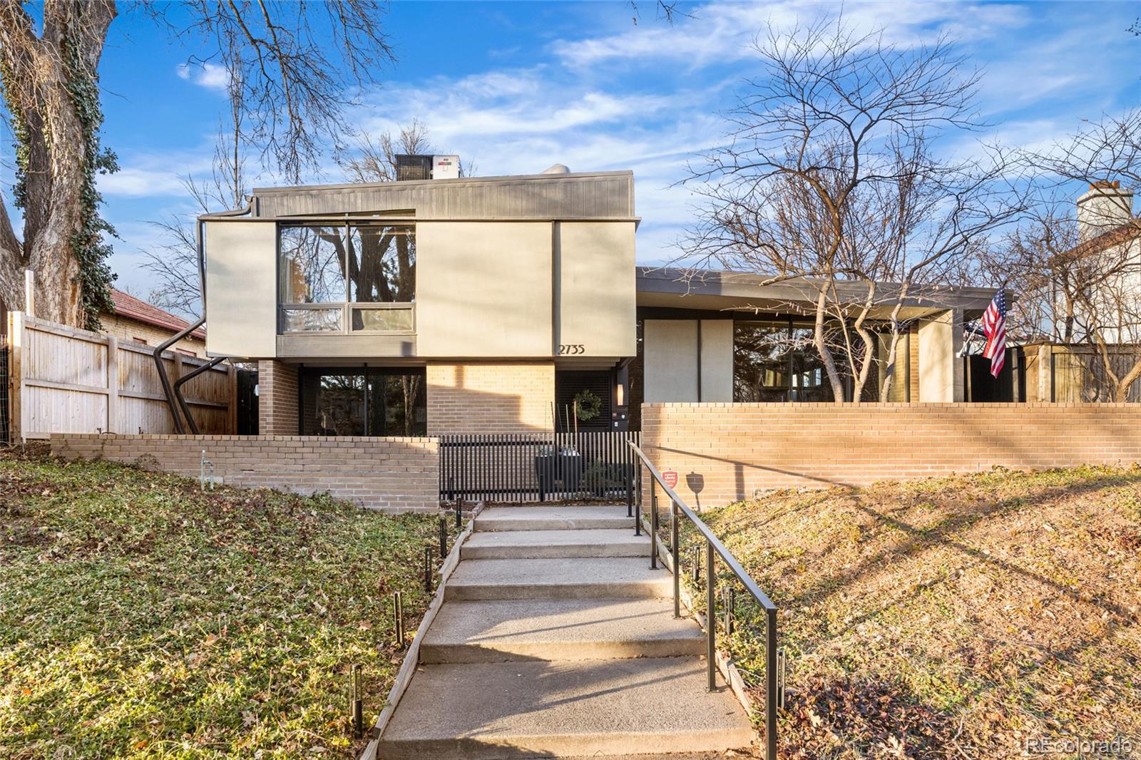 Welcome to 2735 E 7th Ave, a distinguished residence sitting on Denver's coveted 7th Ave Parkway. This classic mid-century home, designed by renowned architect Richard Crowther, exemplifies a harmonious blend of original design and modern functionality. Built in 1963, the property has had only three owners, including Crowther himself, and has been meticulously maintained to preserve its architectural integrity and timeless charm.Spanning approximately 4,032 sq ft, this home features 3 bedrooms and 3 bathrooms, offering ample space for comfortable living. The layout is characterized by clean lines, open living areas, high ceilings, and expansive windows that flood the interior with natural light. The living and dining spaces seamlessly connect with the outdoors. Complemented by a family room, sunroom, and versatile living areas ideal for both everyday life and entertaining.Crowther's architectural vision is evident in the thoughtful details throughout, emphasizing proportion, light, and livability. The kitchen is equipped with modern appliances and generous counter space, providing a direct connection to the main living areas. A spacious den on the 2nd level offers additional remodel flexibility, while the basement includes a historic bomb shelter, a unique feature reflecting the era of the home's original construction.The property also has the potential for a large rooftop deck (with City approval), enhancing its appeal and versatility. This residence offers a rare opportunity to own a piece of architectural history and to reimagine a true mid-century masterpiece in one of Denver's most treasured neighborhoods. Blocks from Congress Park and Cherry Creek North as well as Pocket Park just out the back door.This property offers mid-century enthusiasts the chance to live in a home that beautifully marries historical significance with contemporary living. Experience the legacy and innovation of Richard Crowther's unique design today.