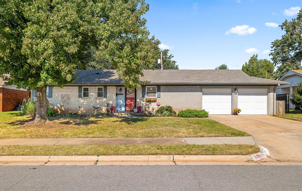 This Great Home is only a few short blocks from Will Rogers Park. The home was beautifully remodeled in 2017 including new shingles, new central heat and air-conditioning and hot water tank, all new white vinyl tilt-out windows, large island in the kitchen with granite counter-tops. Also, the kitchen has new cabinets and kitchen appliances. Both bathrooms were remodeled and all the counter-tops in the home are granite now. All 3 bedrooms are spacious and the living room and kitchen are open. The wood-burning fireplace has a stylish tile surround. Floors are a nice laminate, bedrooms are carpeted and the bathrooms and kitchen are a nice designer tile. There are ceiling fans throughout the home and it was painted inside and out.  The home is fenced and has a very large back yard. Lots of storage space and closets throughout the home. There is a perfect blend of modern upgrades and great family home. The garage provides washer & dryer hookups in an enclosed room and the garage has  ample room for two large vehicles and a small workshop area. The home had a fire in the garage in 2017 and heavy smoke damage throughout the home. This was the reason for the complete remodel in 2017. No problems since the remodel. Conveniently located near shopping, parks, entertainment and all of the major highways. Take a look at it before it is gone. There are very few homes in this price range with these amenities.