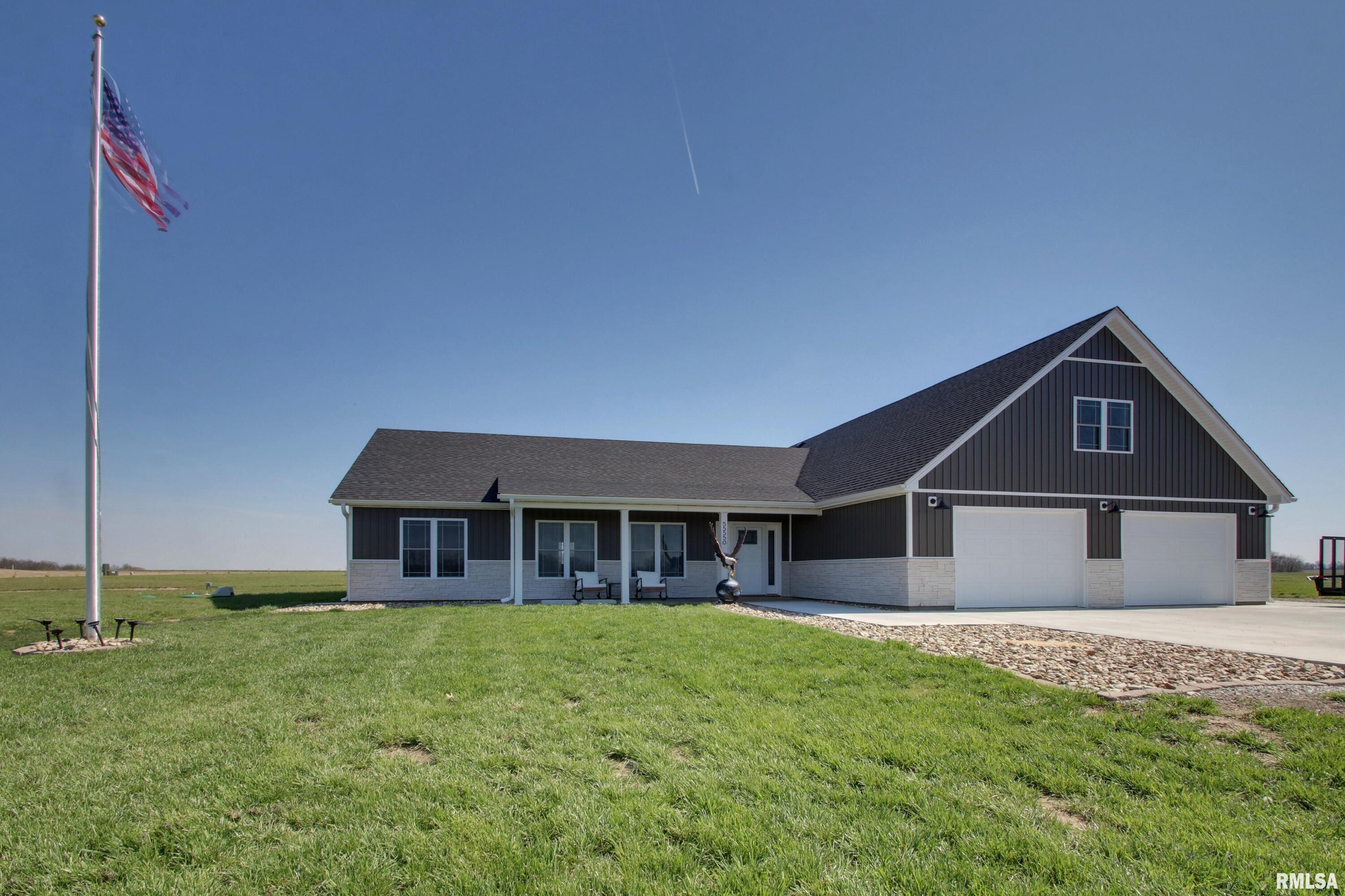 Welcome to this stunning 2024 built ranch home in New London, offering the perfect blend of modern design, functionality, and peaceful country living. Situated on 3 acres this 4 bedroom, 2 bath home provides over 2,000 square feet of thoughtfully designed space.  Step inside to an open concept layout highlighted by vaulted ceilings and durable, low maintenance luxury vinyl plank flooring throughout. The light and bright custom kitchen is the heart of the home, featuring ample cabinetry, stone countertops, a massive central island perfect for gathering, and an impressive 5x9 walk-in pantry ideal for storage and organization.  The private primary suite is a true retreat, complete with a spacious walk-in closet and a beautifully designed oversized walk-in shower. A split bedroom floor plan offers two additional well sized bedrooms and a full bath on the opposite side of the home, while a versatile bonus room above the oversized attached two car garage serves perfectly as a fourth bedroom, office, or flex space.  Enjoy outdoor living with a 24x28 poured concrete patio and fire pit area perfect for entertaining or relaxing under the stars. And you wont have to worry about privacy as the current owner has planted over 65 evergreens to surround the property and create peaceful seclusion for years to come. With a slab foundation, modern construction, and room to spread out, this property delivers comfort, efficiency, and style in a serene country setting.
