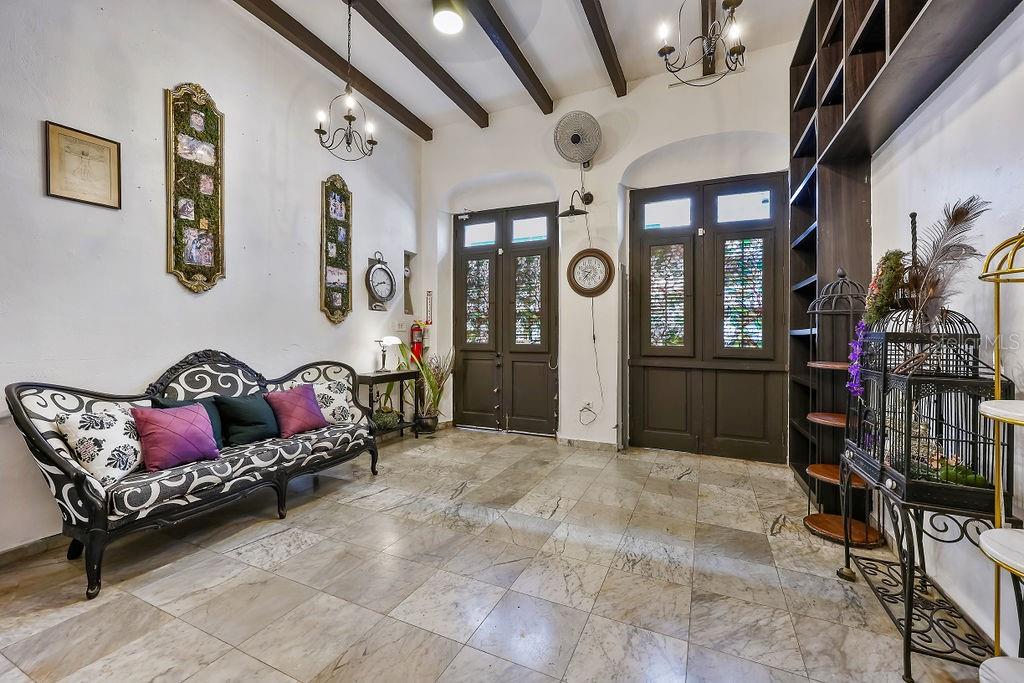 A rare opportunity to own a truly unique historic gem in the heart of Old San Juan, offering rich Old World charm and an enviable location on a quiet, centrally located one-way street. Spanning approximately 1,573 square feet (146.20 m²) across three levels and totaling 7,530 square feet of lot area, this versatile property features 3 bedrooms (convertible to 4) and 4 bathrooms. It may serve as a single-family residence or be divided into two independent units for short-term rentals, an art gallery, café, or other commercial use—as permitted by local zoning and the Puerto Rico Institute of Culture.

Constructed in concrete and masonry, the property features rooftop terraces and two charming interior patios, ideal for outdoor dining and entertaining. With breathtaking views of El Morro and the ocean, this is a prime opportunity for residential living or income-generating investment.

Old San Juan is the cultural epicenter of Puerto Rico and home to several UNESCO World Heritage Sites. As one of the Caribbean's top tourist destinations, it is celebrated for its architectural elegance, historical significance, and vibrant lifestyle. The area is renowned for its extensive dining, shopping, and nightlife options. Just steps away from the iconic Calle San Sebastián—only two properties away—this location places you at the center of it all.