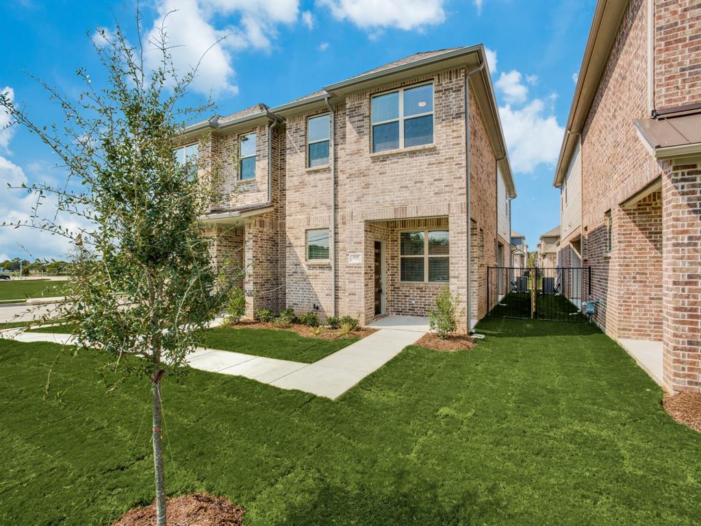 Beautiful Townhome Ready Now for new tenant! Fresh paint 2026. 3 BR, two and one half baths! Two car garage. Modern finishes throughout and loaded with upgrades including granite in all bathrooms! Large kitchen with island, granite, Stainless steel GAS cooktop appliance package, custom cabinets. upgraded tile everywhere except bedrooms. Primary suite has large full tile walk in shower, two sinks, large walk in closet! Window coverings, great energy features for low bills. Main living downstairs and walk up to a small living area and 3 bedrooms, split.  Separate laundry room and small fenced area.  Application required for all tenants 18 years and over.  NO PETS.