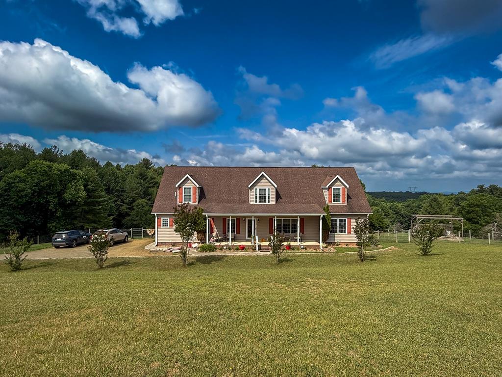 Welcome home to this spacious 5-bedroom, 3-bathroom home situated on 3 beautiful acres, offering the perfect blend of comfort, privacy, and room to grow. The thoughtfully designed floor plan features a main-level primary suite with its own private bathroom, while two additional bedrooms and a full bath are located on the opposite end of the home, creating an ideal layout for families or guests. Upstairs, you'll find a second living room, along with two additional bedrooms and a full bathroom, providing a flexible space for a growing family, guests, or a private retreat. The beautifully updated kitchen offers ample cabinet and counter space, making it the heart of the home for cooking, entertaining, and everyday living. Newer flooring throughout adds a fresh, modern touch, while the screened-in back porch is the perfect place to relax and take in the peaceful surroundings. Outside, enjoy a fenced backyard that's ideal for children and pets, along with 3 acres of land offering plenty of space to explore, garden, or simply enjoy the outdoors. If you've been searching for a home with space, functionality, and room to grow, this property is ready to welcome its next owners.