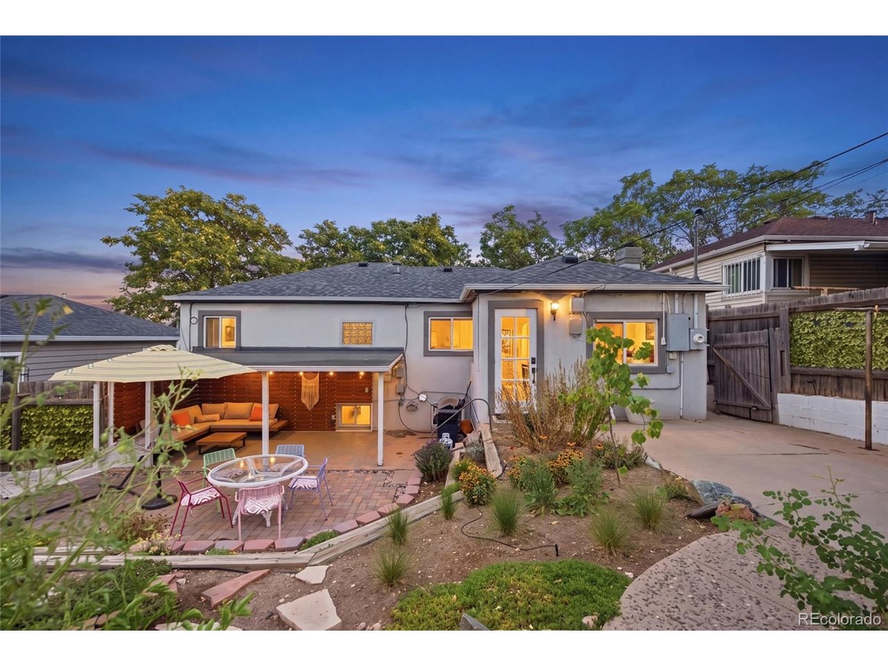 Offset your mortgage with income from this established fully furnished Househack Airbnb property! This 3 bedroom, 2 bath home offers a unique combination of comfortable living space and proven rental income. The separate lower-level Airbnb comes completely furnished with its own entrance and has generated approximately $40,000 annually since 2023, providing an immediate opportunity for a new owner to continue an established short-term rental operation.The upstairs has been thoughtfully updated with refinished hardwood floors, a brand new bathroom, fresh paint and drywall, new carpet in the secondary living room, new baseboards and light fixtures throughout, plus an updated kitchen featuring epoxy-finished countertops and new cabinet doors. Outside, enjoy a newly added covered patio (outdoor furniture included), landscaped yard with wildflowers, and a new fence along the back of the property.Additional highlights include views of Downtown Denver and a location close to the city's dining, Bronco's Stadium, meow wolf, entertainment, parks, and more.