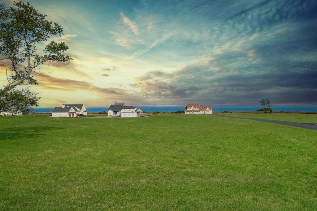 Finally YOU have found the perfect canvas for your dream home on Virginia's Eastern Shore. This beautiful 3-acre corner lot in the exclusive Corbin Hall community gently slopes & compliments the panoramic vista of the Chincoteague Bay's shimmering waters. While the elevated position ensures unobstructed views from multiple vantage points, the neighboring properties boast elegant, custom architecture & abundant outdoor living spaces- enhancing the beauty of the natural surroundings & the property itself. This is country living at its best- w/ room to breathe, yet conveniently located- 3 hrs. to DC/ Baltimore. OC, MD 45 min away.  Community amenities include: gardens, club house (w/ guest suites), pool, community boat launch & dock. This is a true gem- A MUST SEE. No flood insurance needed.