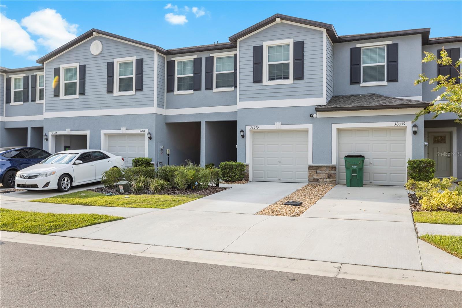 Experience elevated living in Abbott Square, where modern design meets resort-style amenities in one of Zephyrhills’ fastest-growing communities. Perfectly positioned for comfort, convenience, and connection, this townhome offers an exceptional opportunity to own a 2023-BUILT, 3-BEDROOM, 2.5-BATH HOME with every detail thoughtfully designed for today’s lifestyle.

Residents of ABBOTT SQUARE enjoy exclusive access to a RESORT-STYLE POOL, MODERN CLUBHOUSE, STATE-OF-THE-ART FITNESS CENTER, GAME ROOM, PLAYGROUND, and SCENIC WALKING TRAILS, amenities that rival luxury developments at a fraction of the price.

Inside, the open-concept floorplan showcases a CHEF-INSPIRED KITCHEN WITH STAINLESS STEEL APPLIANCES, an oversized island, and plenty of cabinet space, ideal for both entertaining and daily living. The light-filled living and dining areas offer a seamless flow and inviting atmosphere.

Upstairs, the spacious PRIMARY SUITE FEATURES A WALK-IN CLOSET AND PRIVATE BATH, while two additional bedrooms and a VERSATILE LOFT SPACE provide room to spread out. A convenient upstairs laundry room adds to the home's thoughtful layout.

With ENERGY-EFFICIENT SYSTEMS, SMART HOME TECHNOLOGY, and low-maintenance finishes throughout, this home is ready to go. Enjoy your own PRIVATE OUTDOOR PATIO SPACE, perfect for morning coffee or winding down after a long day.

Located just minutes from TAMPA PREMIUM OUTLETS, THE SHOPS AT WIREGRASS, EPPERSON LAGOON, and more, with EASY ACCESS TO I-75, HWY 301, AND SR-54, this home offers a straight shot into DOWNTOWN TAMPA, Wesley Chapel, and the airport.

If you're searching for lifestyle, location, and like-new construction all in one, this is the home that checks every box.