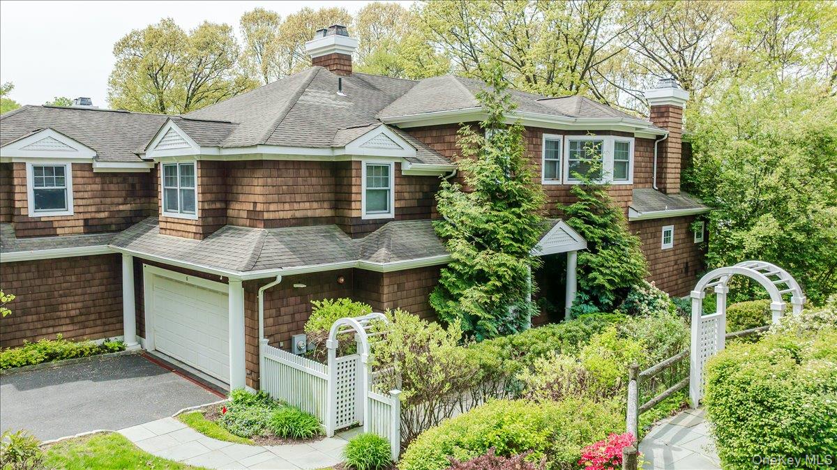 Rare end-unit townhome in the coveted Riverpointe community offering sweeping Hudson River and Palisades views. This sun-filled residence spans approx. 3,425 sq ft and features gracious proportions, hardwood floors, custom moldings, and a fireplace with built-in cabinetry anchoring the living and dining areas. The open main level includes a gourmet eat-in kitchen with high-end finishes, premium appliances, large range, and double ovens, flowing to a private balcony with river views. The home offers four bedrooms, an ensuite office/bonus room, three full baths, and a powder room. The expansive primary suite features two oversized walk-in closets, a spa-like bath with jacuzzi tub, skylight, and private balcony overlooking the Hudson. The lower level includes a spacious family room with walk-out access to a 15’ x 19’ bluestone patio and landscaped garden, plus laundry and storage. Additional highlights include a two-car garage, two-car driveway, nearby visitor parking, and meticulously maintained grounds. Enjoy direct access to the Lenoir Nature Preserve and the Old Croton Aqueduct Trailway. HOA provides exterior maintenance, landscaping, snow removal, roof, siding, and deck care. Just a 10-minute walk to the village and Metro-North; approx. 35-minute commute to NYC.