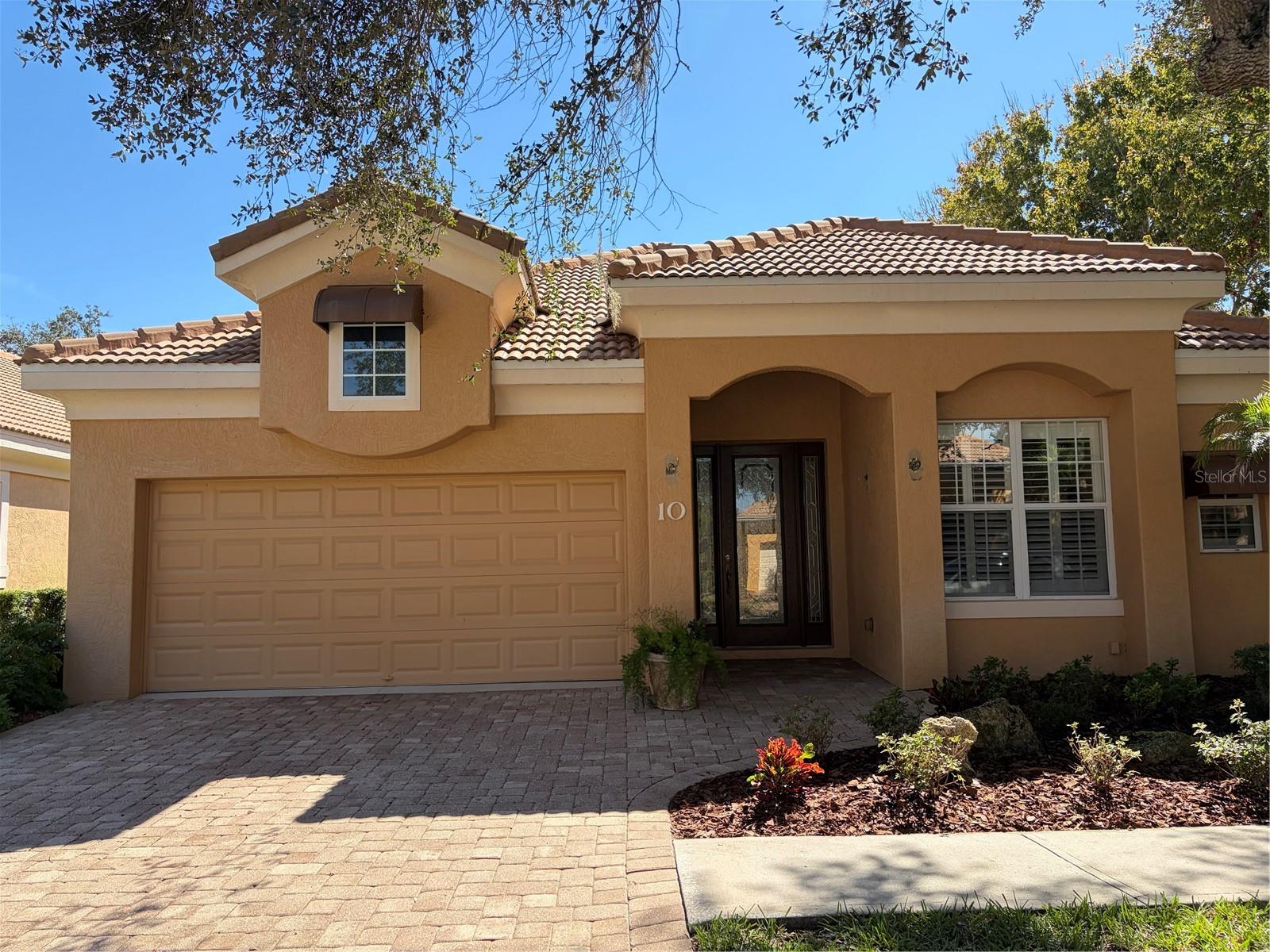 Fantastic location near Creekside pool, Tikki bar and amenity center! Just updated home includes new luxury vinyl planks in all three bedrooms, new custom refrigerator and elevated toilets.  Large living room and dining room for entertainment with engineered hardwood floors and vaulted ceilings.  View of the pond from kitchen and living room add a tranquil feel. Three bedrooms with plantation shutters and walk in closet in Master Bedroom.  Eat in kitchen nook with plantation shutters and large windows. Plenty of storage too in floored attic. House was just inspected and is all set for its new owners.  Many social activities available such as water aerobics, Trivia night in the cafe, pickleball, tennis, bocce ball, dog park, and golf membership for purchase.