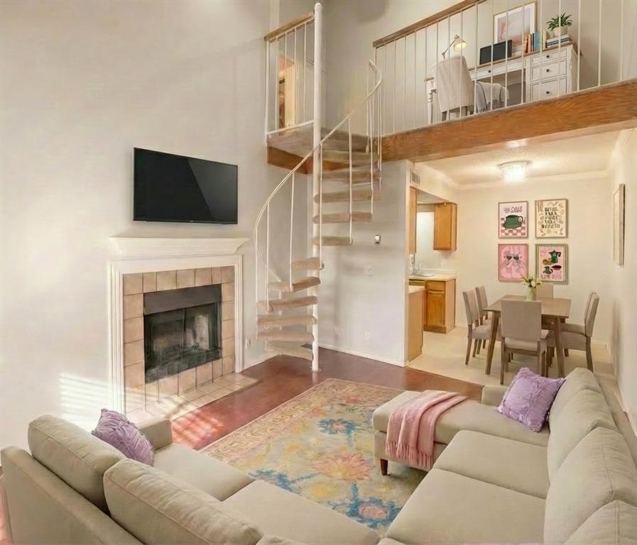 Nestled within the secure, gated Stratford Place community in Northwest Oklahoma City, this bright and welcoming condo combines everyday convenience with impressive architectural charm. Soaring ceilings and a cozy fireplace anchor the sun-drenched, open-concept living space, while a distinctive spiral staircase leads to a flexible upstairs loft that easily functions as a home office, extra bedroom, or second lounge area. Beyond the home's stylish interior, residents can take full advantage of neighborhood amenities—including two refreshing swimming pools and well-maintained green spaces—all while being located just minutes away from Lake Hefner, major highways, and local shopping destinations.