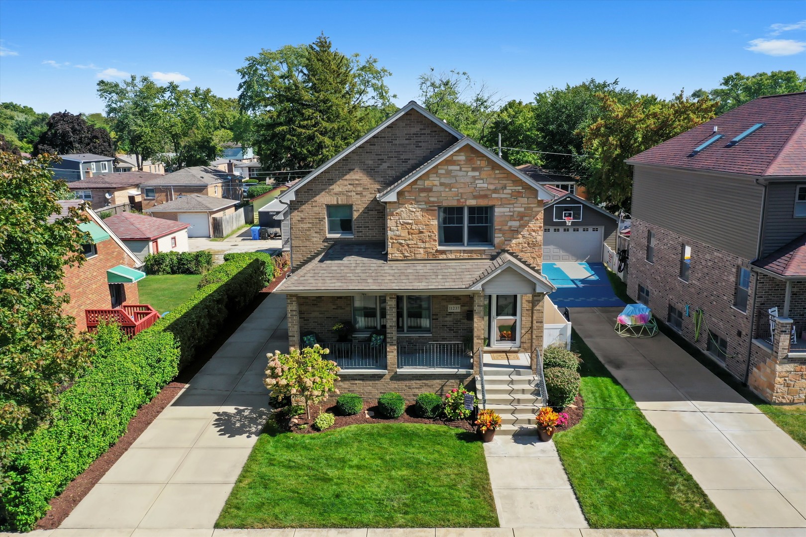 GORGEOUS NEWER HOME ON AN OVERSIZED LOT.  1st FLOOR IS AN OPEN CONCEPT AND GOURMET KITCHEN WITH MAPLE CABINETS, GRANITE COUNTERS, WALK-IN PANTRY AND STAINLESS STEEL APPLIANCES.  OAK HARDWOOD FLOORS. SLIDING DOOR TO OVERSIZED CEDAR DECK.  3 1/2 STUNNING BATHROOMS.  LOVELY FULL FINISHED BASEMENT WITH 9 FT. CEILINGS THAT IS GREAT FOR ENTERTAINING. PICTURESQUE BACK YARD.  SIDE DRIVE TO GARAGE WITH EXTENSIVE 2nd FLOOR STORAGE.  SPRINKLER SYSTEM. JUST AN INCREDIBLE HOME WITH TOP OF THE LINE FINISHES.