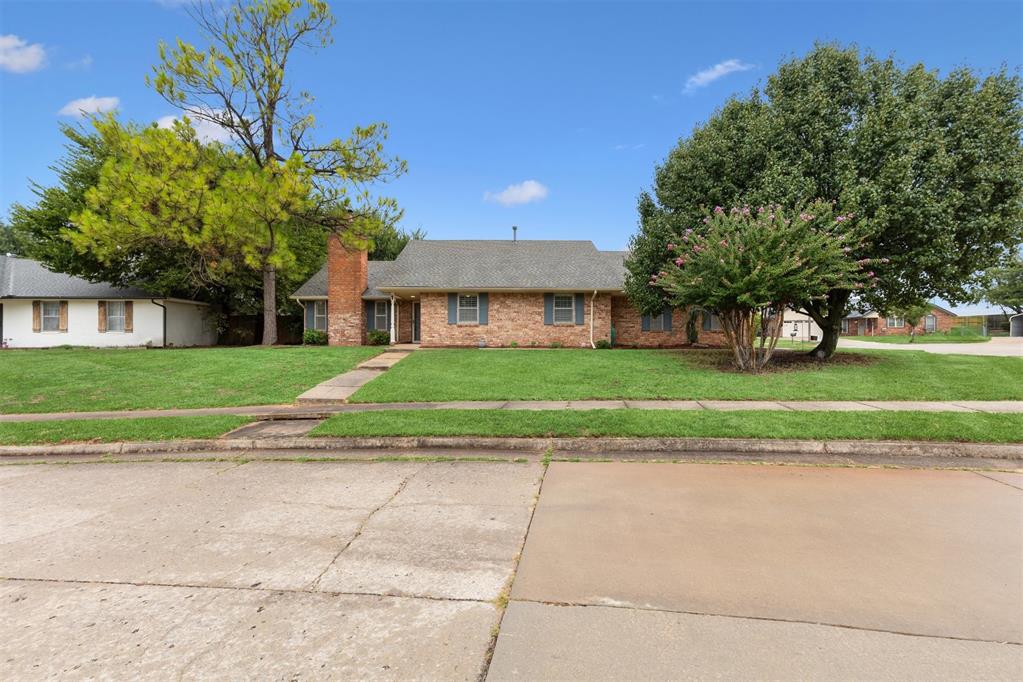 Don't miss out on this great single family home located on a large corner lot in the popular East Hills addition. This 3 bedroom 2 bathroom home has been updated with fresh paint, updated kitchen and master bath, and plantation shutters. The large open living room is spacious with a brick wood burning fireplace. The home has wood vinyl flooring throughout with the exception of the bedrooms which have new carpeting. The kitchen has been updated with new cabinets, granite counter tops, a porcelain farm sink, & stainless steel appliances. The primary bedroom has plenty of room for a king sized bed. A barn door leads you into the updated primary bathroom with an oversized walk-in closet, granite counter tops, and a fresh walk-in shower. The back yard consists of a covered patio, plenty of yard space, & an in-ground storm shelter. An added bonus with this home is a 9'x9' room off of the garage that is cooled by a small unit (not included in square footage). This space would be a perfect office or hobby space. Washer, dryer, and refrigerator will stay!