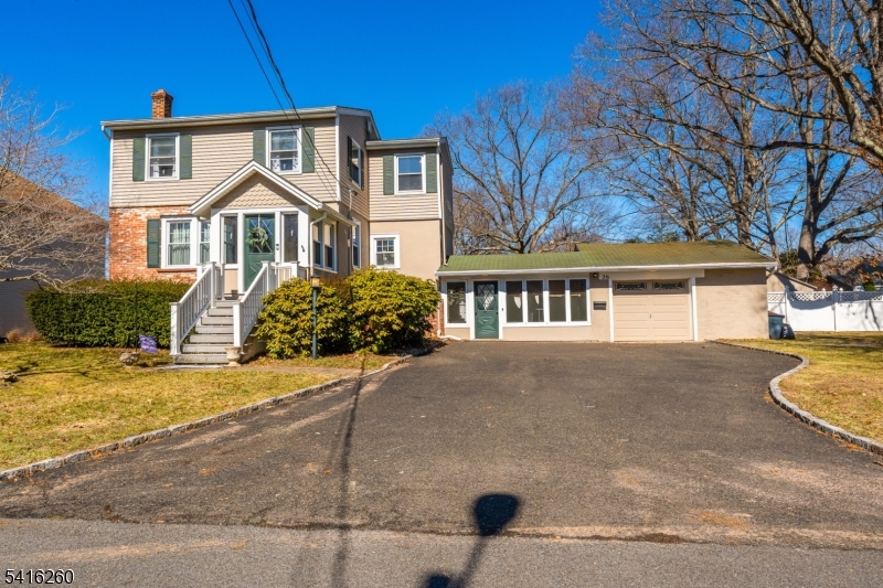 Welcome to this exceptional single-family home in the highly desirable community of New Providence, New Jersey perfectly suited for commuters seeking the ideal balance between suburban tranquility and city access. With a convenient direct commute of under one hour to New York City, this home offers the best of both worlds. Step inside to discover spacious, comfortable living areas designed for everyday living and entertaining. One of the home's standout features is a **walk-in wine cellar**, ideal for collectors or anyone who enjoys hosting and showcasing a curated wine collection. Outside, you'll find a **large, private backyard** offering endless possibilities whether you envision summer barbecues, gardening, outdoor entertaining, or simply relaxing in your own peaceful retreat. Located in a charming town known for its strong sense of community, excellent amenities, and it has been voted one of the safest and best towns in NJ, this property truly embodies the concept of a commuter's dream.