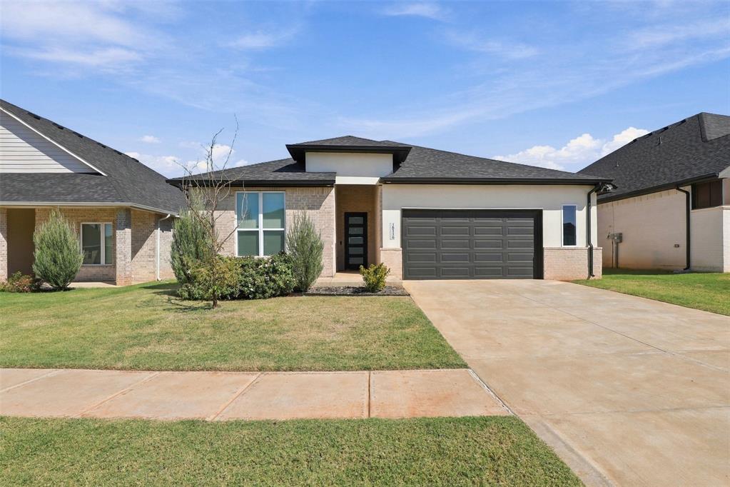 15116 Jasper Ct is a stunning, modern single-family residence built in 2022 and located in the highly desirable Twin Silos community of Edmond, Oklahoma within the top-rated Deer Creek school district. This contemporary, one-story home offers 3 bedrooms, 2 bathrooms, and 1,896 square feet of bright, open living space. The interior boasts a spacious, open-concept main living area with vaulted ceilings, a beautiful focal-point fireplace, and durable wood-look tile flooring. It flows seamlessly into a chef-inspired kitchen equipped with a large central island, floor-to-ceiling cabinetry, under-cabinet lighting, a corner pantry, and a gas cooktop.Designed with a split-floor plan for ultimate privacy, the luxurious primary suite features a spa-like bathroom with a free-standing soaking tub, a separate glass-enclosed shower, dual vanities, and a massive walk-in closet that connects directly to the laundry room. Outside, you can enjoy a fully fenced backyard from the comfort of a covered patio, complete with an underground sprinkler system, alongside an attached 2-car garage with extra storage space. As a resident of Twin Silos, you will also gain access to premium community amenities, including a pool, clubhouse, playground, fitness trails, and basketball courts, all while being just minutes away from shopping, dining, and the John Kilpatrick Turnpike.