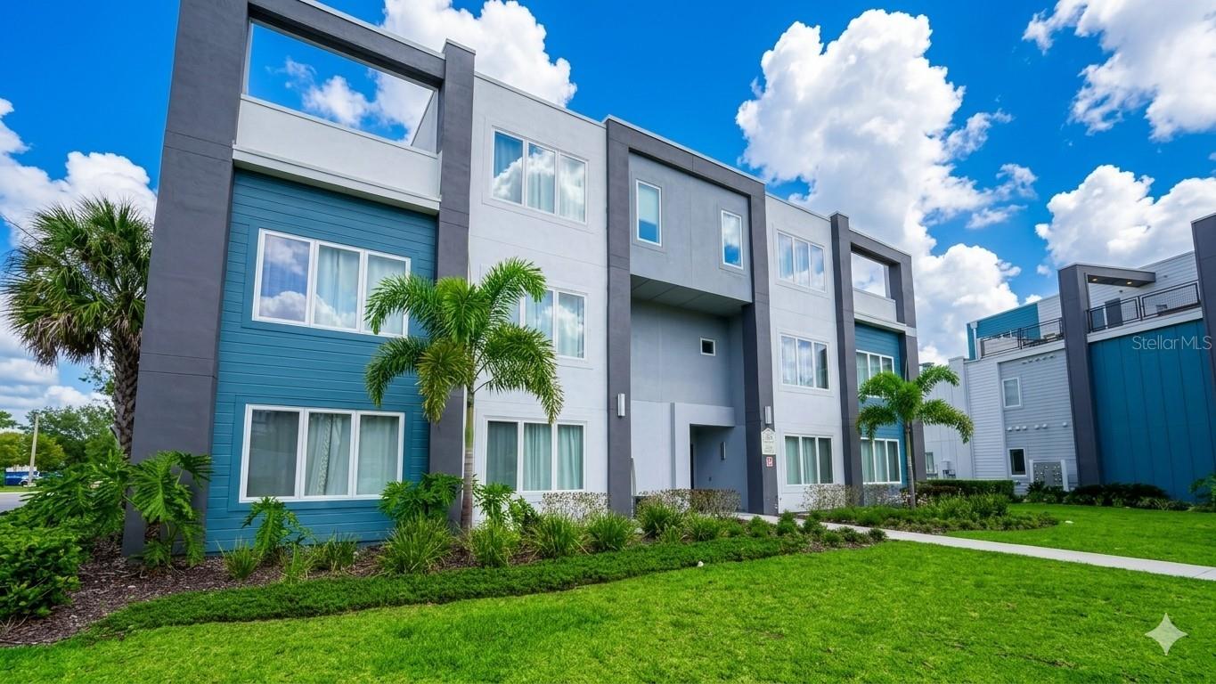 Imagine waking up where the world comes to play. ????Your morning begins in a sun-drenched, contemporary sanctuary at Spectrum+. As you brew your first espresso in a sleek, quartz-clad kitchen, the high ceilings and open-concept flow remind you that this isn't just a stay—it’s an upgrade.While the rest of the resort begins to stir, you step out onto your massive, fenced-in private patio. Because you’re on the first floor, the transition is effortless. Here, behind your private fence, you have the rare luxury of total seclusion. A perfect place to spend the morning sunbathing in peace or planning the day’s adventures.By noon, the "Reunion Lifestyle" takes over. You’re a quick golf cart ride away from three championship courses designed by the legends—Nicklaus, Palmer, and Watson. Or perhaps today is a "water park day," spent drifting down the five-acre lazy river before meeting friends for rooftop cocktails at one of the five on-site restaurants.As the sun sets, the magic of Orlando is just 15 minutes away, with the Disney World shuttles standing by. Whether this is your private family retreat or a high-performing asset in your investment portfolio, this residence offers something truly rare in a condo: The privacy of a home with the soul of a world-class resort.Reunion is calling. Are you ready?*Room sizes, square footage and HOA are approximate and should be independently verified by buyer/buyer's agent. All information contained in this listing is believed to be reliable but is not guaranteed or warranted