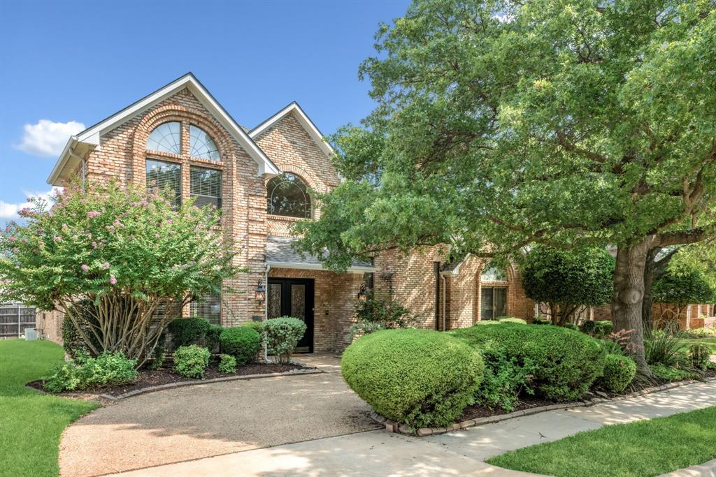 ALL OF THE SPACE YOU COULD NEED is offered in this hard to find FIVE BR floorplan just steps away from Plano's prettiest wooded hike & bike trail and Chisholm Trail Park all in the heart of sought after Forest Creek Estates...voted PLATINUM LEVEL BEST NEIGHBORHOOD year after year! A stunning leaded glass double door entry leads you into the soaring two-story foyer with incredible three-sided staircase that is the central focal point in the open floorplan. And what a floorplan! Generous room proportions and ideally situated bedroom layout offer sought after Primary + 5th bedroom DOWN plus three BIG bedrooms and two full baths plus loft UP!  Split formals have hardwood floors, and the Living Room's floor to ceiling fireplace ...just WOW! HUGE island Kitchen offers ample custom cabinetry, updated LED lighting, stainless steel appliances including double ovens, granite counters and is OPEN to a STUNNING two-story Family Room! The Kitchen also has a giant walk-in pantry and a built-in hutch with leaded glass doors + planning desk! Family Room has a handsome onyx marble raised hearth fireplace, plenty of space for oversized furniture to host a crowd and is wrapped in warm picture frame paneling! Double French doors lead to the expanded covered patio and completely PRIVATE yard with lush lawn + space for a pool. Primary Bedroom Suite is split for privacy and features cathedral ceiling, hardwood floors and updated bath that feels like a SPA with oversized rain shower, marble counters, polished chrome fixtures. A huge skylight floods the space with natural light! Downstairs you will also find a totally private 5th bedroom wing with hardwood floors, HUGE walk-in closet and adjacent full bath, making the ideal space for visiting or live in in-laws (or nursery or study...the flexibility of the space evolves with your growing family!). Don't miss your opportunity to move into a neighborhood everyone wants to live in with room to grow at an excellent price!