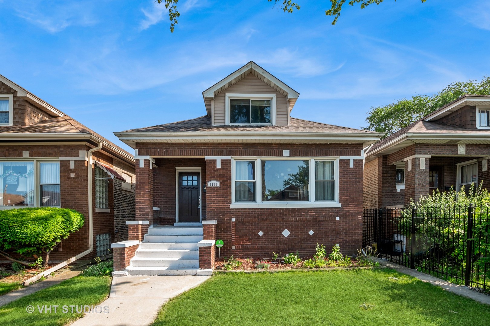 Oversize bungalow with three fully finished and updated levels. Hardwood floors, high ceilings, stainless appliances and so much more. Top floor has two spacious bedrooms and two full baths, including an ensuite with vaulted ceilings and skylight. Main level has two additional full bedrooms, full bath, huge living room and kitchen with island. The lower level has a spacious family room with great storage, huge laundry/utility room, fifth bedroom, fourth full bath, and even a mudroom with exterior entrance from the back yard. Step out onto the rear deck and enjoy the privacy of your fully fenced backyard on an oversize lot. Located in one of Chicago's most desirable pockets, close to schools, parks, public transportation, and everything the city has to offer. *Please note - property tax amount does not include homeowner exemption*
