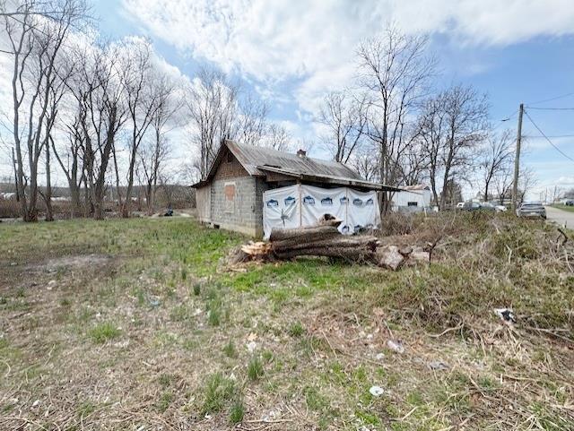 0.17 acre lot with an unlivable, older cinderblock home on site.