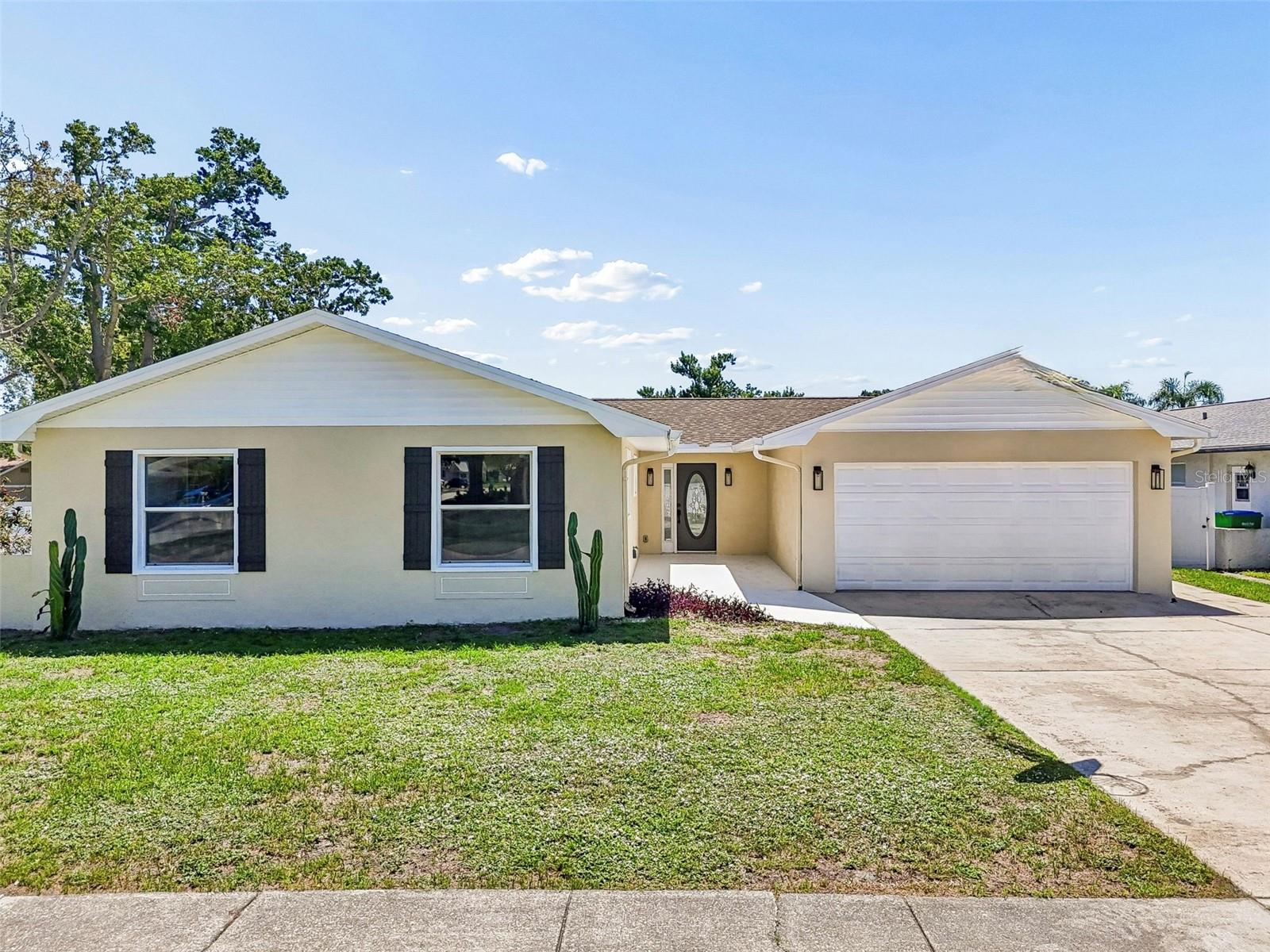 DESIRABLE DUNEDIN POOL HOME ON A CORNER CUL-DE-SAC LOT! This spacious 2,316 sq ft home. Major expensive components have already been updated providing peace of mind and reducing future maintenance costs! NEW ROOF (2025), NEW WATER HEATER (2025), HVAC (2023), fresh interior and exterior paint(2026), updated lighting, and new ceiling fans. The open layout flows seamlessly to the screened pool, creating the ideal setting for entertaining and enjoying Florida's outdoor lifestyle. Additional highlights include a storage/workshop, ample yard space, and a desirable location just minutes from downtown Dunedin, Honeymoon Island, shopping, dining, and Gulf beaches!