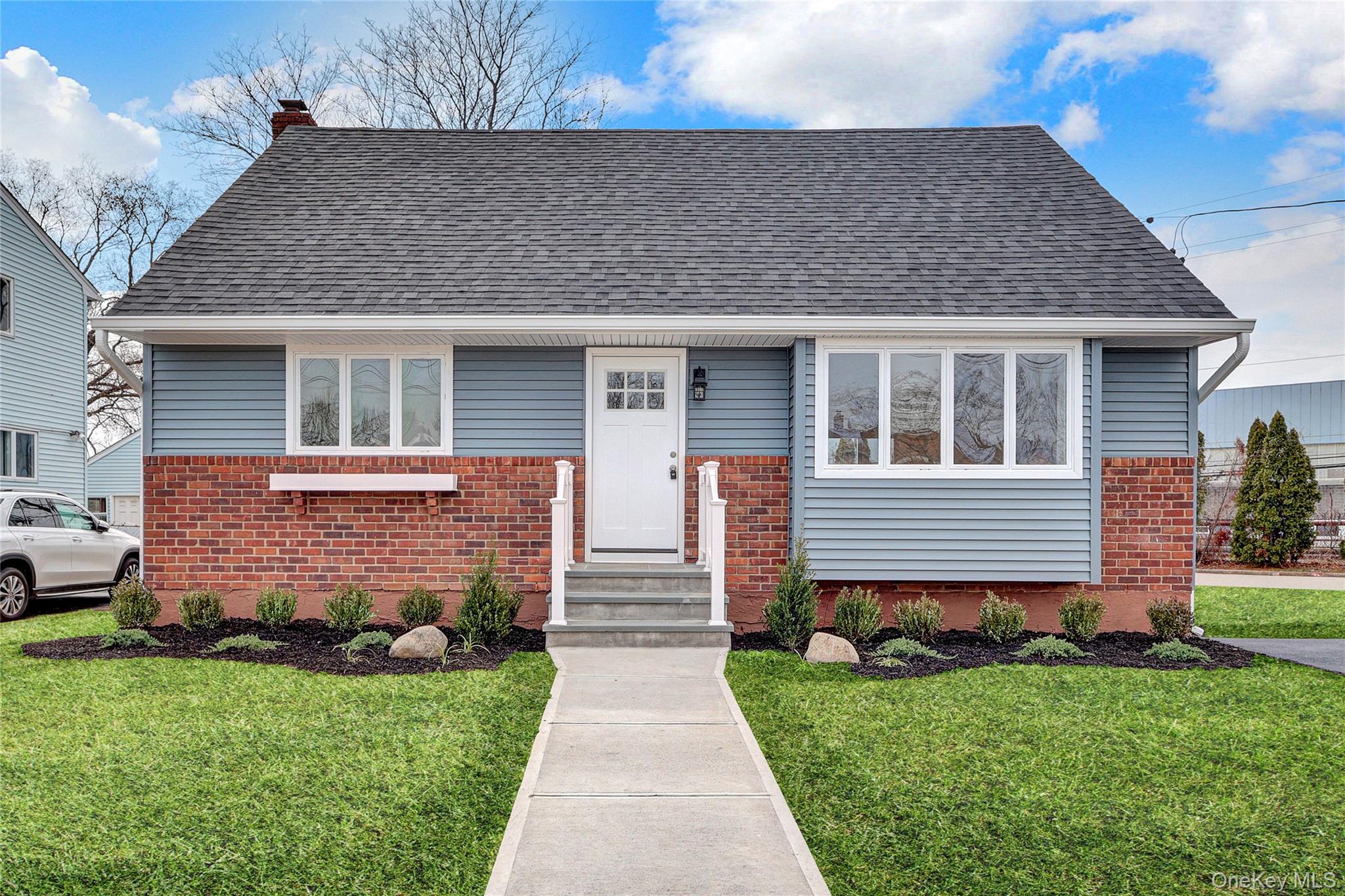 Move right into this updated four-bedroom, two-bathroom Cape-style home with a full basement, updated kitchen with quartz counters and stainless steel appliances, updated bathrooms, updated flooring and carpeting, fresh paint, new roofing, and new siding. Close to local shopping, transportation, and amenities. Don't miss this opportunity!