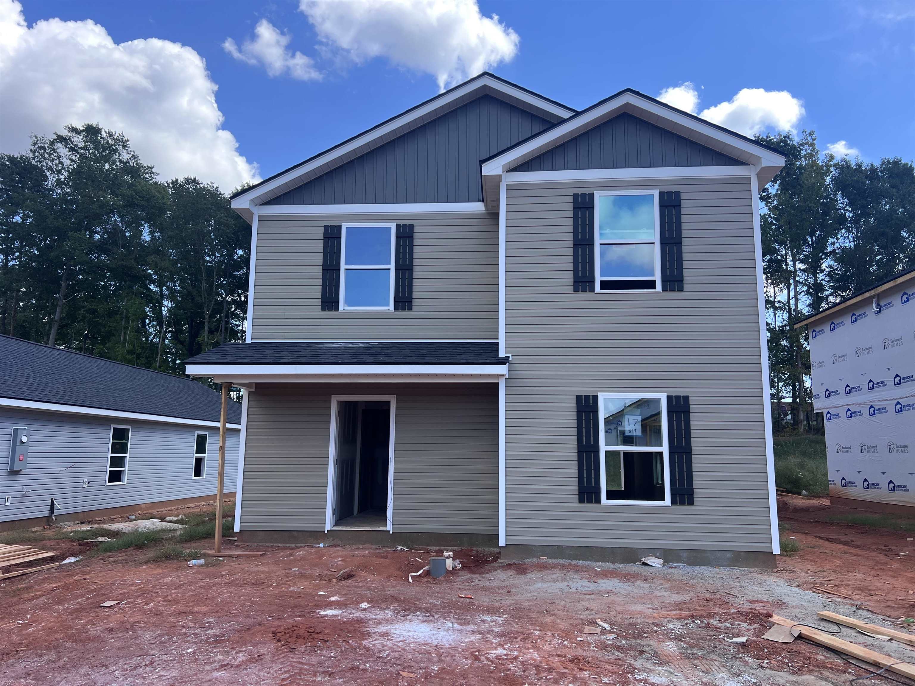 The Riley (Lot 17).  New construction home built by local builder in Spartanburg! The Riley Plan is a 3 bed 2.5 bath two story home with study offering 1615 sqft. Other features include Luxury vinyl plank flooring, fully sodded yard, covered patio, double vanity in master bath and more. 10 year warranty included with 30 year architectural roof. Built with quality craftsmanship, this new construction home combines comfort, efficiency, and value. Conveniently located in the Arcadia Village community with easy access to both interstate 85 and I-26, shopping, dining, schools, etc. Ask about $7500 builder incentive. Community will include playground and dog park. Must see!