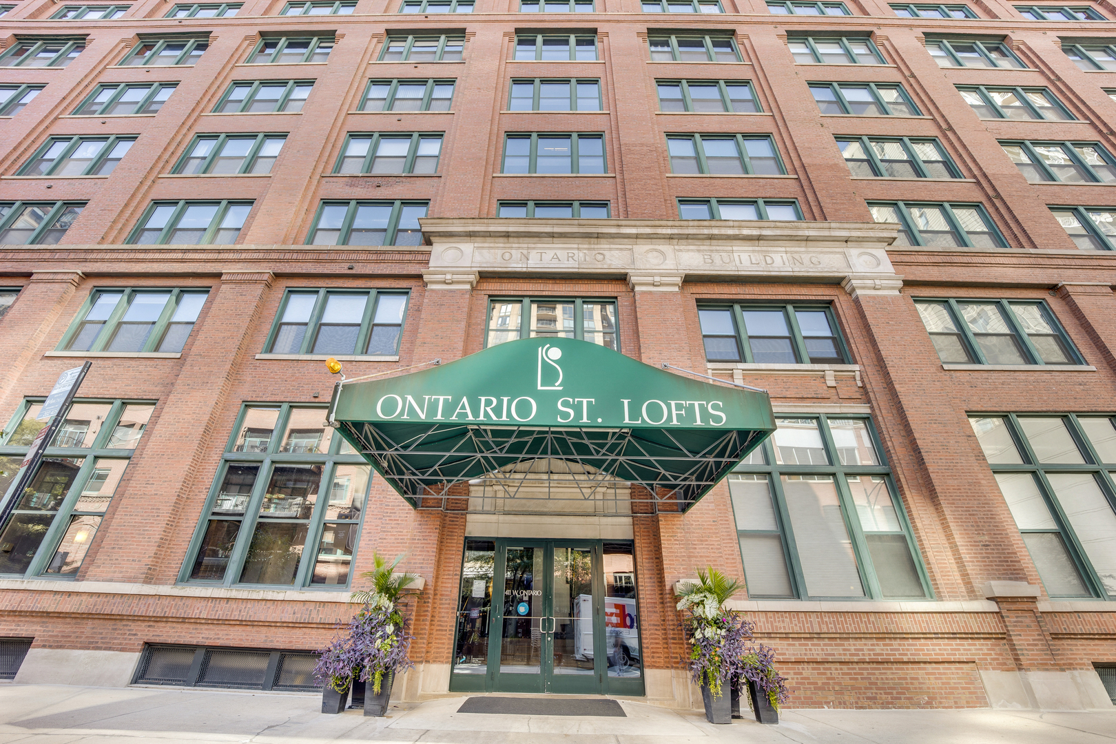 This River North gem checks every box-soaring cement ceilings, oversized industrial windows, abundant natural light, gleaming hardwood floors, secure heated garage parking, in-unit laundry, new carpet in the bedroom, wood burning fireplace AND a newly rehabbed bathroom!  Enjoy the unbeatable energy of River North-where vibrant city life meets a neighborhood feel.    The building offers 24-hour door staff, a fitness center with yoga room, and a stunning rooftop deck with skyline views.  With over \$1M in reserves and rentals allowed, this is both a dream home and a smart investment. Pets welcome!