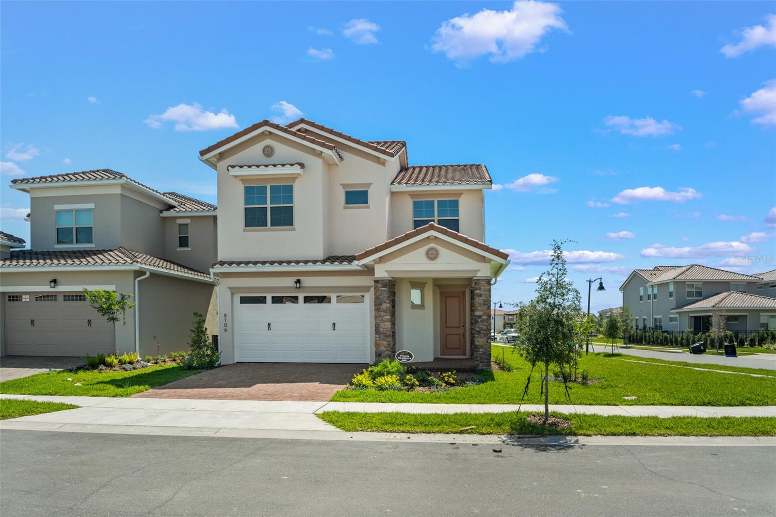 **This property qualifies for a closing cost credit up to $12,000 through the Seller’s preferred lender (restrictions apply).** Why Wait to Build? Your Dream Home Is Move-In Ready! This 2023 Peachtree model is ready and loaded with high-end upgrades from top to bottom. Located on a desirable corner lot, this stunning home offers 4 bedrooms, 3.5 bathrooms, and a spacious upstairs bonus room—perfect for a media room, playroom, or second family space. The first floor features a bright open-concept layout with beautiful ceramic tile flowing seamlessly throughout. The showstopper kitchen boasts waterfall quartz countertops, bar-top seating, floor-to-ceiling cabinetry, and stainless steel appliances—designed for both style and function. The space flows into the dining and living areas, filled with natural light from large windows and sliding glass doors that lead to your outdoor space. The main-floor primary suite offers the ultimate retreat with a spa-like en-suite bathroom, featuring a double-sink vanity, floor-to-ceiling tile backsplash, and a large glass-enclosed walk-in shower with a rainfall showerhead. The walk-in closet connects directly to the laundry room, which circles back to the kitchen for ultimate convenience. Upstairs, enjoy a bonus loft with a wet bar, ideal for entertaining. You'll also find three generously sized guest bedrooms and two full bathrooms on the second level—perfect for family or guests. Located in a sought-after resort-style community, you’ll enjoy amenities including a golf course, clubhouse with restaurant, resort-style pool, fitness center, basketball and tennis courts, 24-hour guard-gated entry, playgrounds, parks, and more. Conveniently located near Medical City, Boxi Park, major highways, and top-rated schools—this move-in ready home offers luxury, location, and lifestyle all in one. Schedule your private showing today!