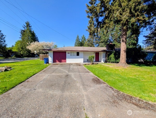 PERMIT APPROVED & PRICE IMPROVEMENT! We've done all the legwork for you, it's ready to build. Imagine building your dream home in the highly sought after LAKE HILLS community! This exceptional investment opportunity combines location, lot size & potential in a way that’s increasingly hard to find, An inspiring canvas to bring your dream home to life. This flat 8,062-SF corner lot (previously used as a family care home), presents an exceptional opportunity to create a custom luxury home in a premier Eastside location in the award-winning Bellevue School District. Completed, attached plans are included for a striking contemporary single-family home w/ ADU, totaling @4,400 SF. The plans imagine a thoughtfully designed home featuring 6 bedrooms & 5 bathrooms maximizing space & functionality. This design plan is flexible for multi-generational living, guest accommodations, or future rental potential. Enjoy the convenience of easy access to I-90 / I-405, along with being just mins from DT Bellevue’s renowned shopping, dining & entertainment. Home is sold as-is. Seller to make no repairs. All permit documents including Geotech, structural engineering, civil engineering, architectural design, Boundary & Topographic & arboricultural surveys & Stormdrain report will be conveyed to the new owner at closing. This property blends unmatched location, endless possibility, and long-term value in an exceptional community. LISTING PRICE includes lot, current residence, plans and permits.