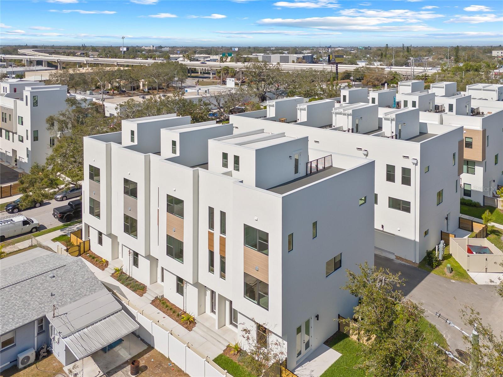 One or more photo(s) has been virtually staged. 20K closing cost incentive for a buyer that goes under contract before the end of February! Enjoy the open rooftop views of downtown! Alante is located just north of the historic EDGE District in St. Petersburg, a global destination and ideal urban living place. Rooted in a rich history of pioneering and industry, the district features restored buildings, landscaped corridors with majestic palms, public art and eclectic shopping, dining, and cultural experiences. Alante offers luxury townhomes living in an ideal St. Petersburg location. This home includes 3 bedroom, 3.5 Baths, open concept living spaces, designer kitchen, quartz countertops, stainless appliances and roof top deck with city views. The property is also built to weather storms-it boasts all block construction, with impact windows and doors, and it is located in a non-flood zone!! Walk to EDGE district, where you'll be in the heart of the city's best shopping, galleries entertainment and restaurants. Located just five minutes from Downtown, 10 minutes to the St. Pete Pier and Spa Beach Park, four blocks north of Tropicana Field and walking distance to the eclectic EDGE District. THIS IS THE LAST INTERIOR 3 BED UNIT AVAILABLE - SNAG IT TODAY BEFORE IT IS GONE TOMORROW!