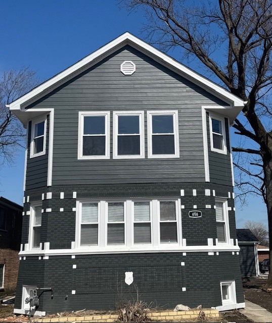 ABSOLUTELY INCREDIBLE TRANSFORMATION!!! ONE OF IF NOT THE LARGEST HOME YOU WILL SEE ON THE SOUTHSIDE!!! 3000 SQUARE FEET ABOVE GRADE WITH A 1500 SQUARE FOOT BASEMENT!!! BRAND NEW 2ND FLOOR ADDITION, BRAND NEW GARAGE, TOTAL RENOVATION. 9FT CEILINGS ON FIRST AND 2ND FLOOR, WITH 8FT CEILINGS IN BASEMENT. 2ND FLOOR HAS 4 BEDROOMS 2 BATHS AND FULL SIZE LAUNDRY ROOM!! MAIN LEVEL HAS TWO DINING AREAS, BEDROOM, BATHROOM, LIVING ROOM, 2 FIREPLACES. BASEMENT HAS 1 BED, 1 BATH AND LARGE FAMILY ROOM. HARDWOOD FLOORS THROUGHOUT HOME.  ALL WORK DONE WITH PLANS,PERMITS, AND INSPECTIONS ARE COMPLETE!