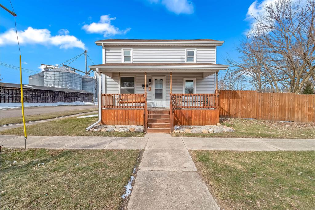 Welcome to 720 Hall Street! Meticulously maintained - a move-in-ready home full of character and comfort. Offering 1,338 square feet of cozy living space, this 2-3 bedroom, 1 bathroom home sits on a large corner lot with beautiful updates inside and out.Step onto the stunning new front porch, complete with a picture perfect charming porch swing -- the perfect spot for morning coffee or relaxing summer evenings. Inside, you'll find two bedrooms conveniently located on the main level, along with a warm and inviting living space. Upstairs features a spacious landing perfect for a home office and third bedroom with a walk-in closet, making it ideal for a private primary suite. The exterior shines with a brand-new privacy fence and an updated patio deck, creating a great space for entertaining, pets, or simply enjoying your backyard retreat. The detached garage includes a lean-to and a massive upstairs loft for additional storage or workspace.Major mechanical updates provide peace of mind, as the sellers have recently replaced the water heater, furnace, gutters, windows, and dishwasher -- making this home truly turn-key.Full of charm, extremely thoughtful improvements, and cozy appeal, this Eaton Rapids gem is ready to welcome its next owners home.