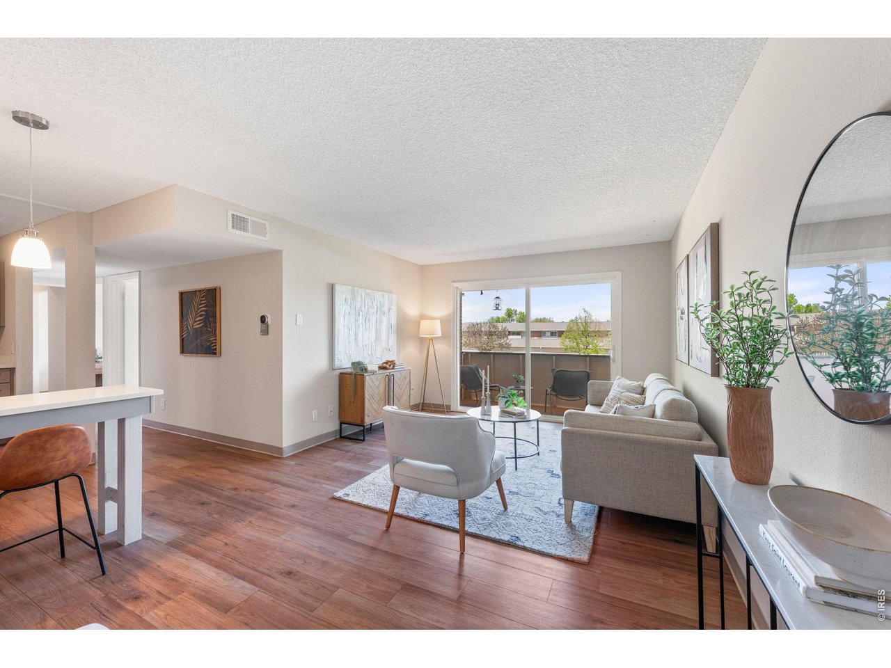 Beautiful move-in ready condo with a functional, open layout connecting the living, dining, and kitchen-ideal for both everyday living and entertaining. The kitchen, redone in 2020, features stainless steel appliances, including a brand new microwave, along with space for an eat-in dining area. The spacious primary suite includes a walk-in closet and an ensuite bathroom with a walk-in shower. Convenient in-unit laundry hookups are located in the closet, with additional common laundry available in the complex. Enjoy a private patio for outdoor relaxation, plus the ease of assigned parking. The HOA offers exceptional amenities, including a clubhouse with an indoor pool, sauna, hot tub, fitness center, tennis courts, and community garden beds. Ideally located near Avery Brewing Company, King Soopers, Human Kind Coffee, and Proto's Pizza, with easy access to miles of trails and open space connecting to Twin Lakes Open Space, Boulder Reservoir, and beyond-reaching Boulder, Niwot, and Longmont. A nearby neighborhood dog park adds to the outdoor lifestyle appeal. With its smart layout, strong amenities, and unbeatable access to recreation and local favorites, this property delivers the perfect balance of location, lifestyle, and long-term investment appeal.