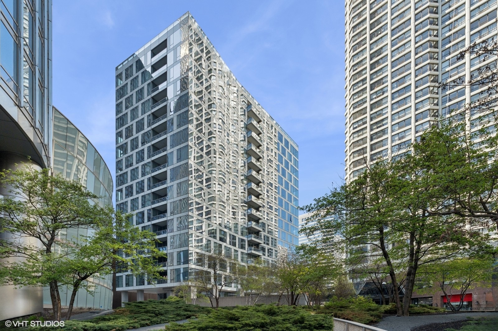 Perched on the 15th floor of Renelle on the River, this impeccable 3-bed, 3.5-bath residence offers sweeping views of the Chicago River and skyline from every room and terrace. The location is second to none-just steps from the Riverwalk and surrounded by some of the city's most iconic architecture. Inside, the home has been thoughtfully upgraded and reimagined for modern, open-concept living. A sleek, neutral palette allows the views to take center stage. A wall between the family and living rooms was removed to create a unified, light-filled space for entertaining, while the kitchen was reconfigured to accommodate a 48-inch Sub-Zero side-by-side refrigerator and a Wolf dual-fuel 6-burner range. Upgraded Snaidero cabinetry, under-cabinet lighting, and enhanced electrical capacity elevate it beyond the standard chef's kitchen. Adjacent to the living room is a southeast facing balcony to enjoy the river and skyline views. Smart technology includes Lutron RadioRa control of lights and automatic motorized shades on all windows. Other bespoke touches feature prominently: upgraded wide plank hardwood floors, custom drapery throughout and custom-made built-in cabinets were added to the primary bath, dining room, third bedroom/office, plus all closets and the laundry room. The primary bath blends a relaxing spa-like atmosphere with function, including a new wall of cabinets and three new Robern lighted medicine cabinets. All bedrooms and bathrooms include ceiling fans, upgraded lighting, and additional outlets. The third bedroom was transformed to flex effortlessly as an office or guest suite, complete with built-in desk, credenza and a pull-down Murphy bed. The home also features a walk-in entry coat closet and walk-in mudroom for convenient luxury. Every inch of this residence has been elevated with meticulous attention to detail-delivering a rare, move-in-ready lifestyle in one of downtown Chicago's most coveted addresses. One first floor garage parking spot included in price. Renelle, a boutique 18-story glass tower designed by bKL Architecture, offers just 50 residences and a full suite of luxury amenities: a rooftop lounge with indoor/outdoor kitchens, game and media rooms, a fitness center with private yoga room, dog run, bike storage, and 24-hour door staff.