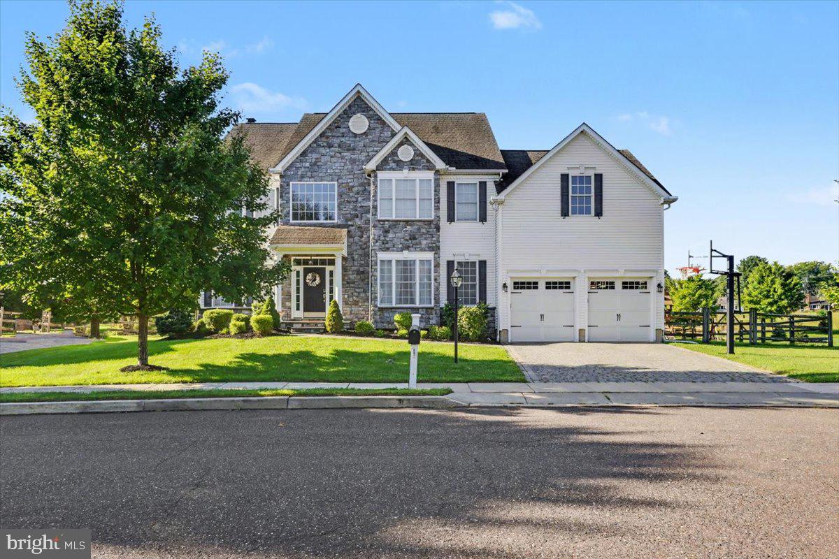 Welcome to Kimberton Meadows, where comfort, elegance, and thoughtful design come together in this beautifully maintained 4-bedroom, 3.5-bath home offering 3,420 square feet of finished living space. Situated on a peaceful cul-de-sac, this 2010 traditional-style home offers a welcoming layout designed for both everyday living and entertaining.Step through the impressive two-story foyer, where the beautiful staircase creates a striking architectural focal point while seamlessly connecting the foyer to the heart of the home. The abundance of natural light throughout the main level creates a bright and inviting atmosphere. Just off the foyer, a versatile room provides the perfect space for a home office, study, or additional flex space, while the adjacent formal dining room offers an elegant setting for gatherings and special occasions.The open-concept main living area flows naturally into the gourmet kitchen, making it easy to stay connected while cooking or entertaining. The kitchen features granite countertops, a double oven, recessed lighting, and a spacious island, while the adjoining living area offers hardwood flooring and a cozy wood-burning fireplace.Upstairs, the spacious primary suite provides a private retreat with a luxurious soaking tub and walk-in closet, accompanied by additional bedrooms and bathrooms offering plenty of space for family and guests.A true standout feature of this home is the brand-new, fully renovated and finished walkout basement. This expansive lower level offers incredible flexibility, including a beautifully refinished bonus room and a full bathroom. Whether used as a guest space, home office, gym, playroom, media room, or additional living area, this versatile finished space provides valuable room to grow and direct walkout access to the backyard.Another exciting opportunity awaits above the garage. Accessible directly from the primary bedroom, this spacious attic area features an open cathedral ceiling and offers the potential to be fully renovated and transformed into additional living space, a private retreat, office, studio, or whatever best suits your needs. This unfinished space provides a unique opportunity for the next owner to customize and expand the home's functionality.Step outside and enjoy your own private outdoor retreat. The fenced-in backyard features a deck and patio area complete with a firepit, creating the perfect setting for summer gatherings, evenings outdoors, or simply relaxing at home. The yard backs to an open common area, providing a peaceful backdrop and a sense of additional space.Additional highlights include a two-car garage, paved driveway, extensive hardscaping, landscaped grounds, vinyl and stone exterior, and beautiful backyard views. Conveniently located near local amenities while tucked away in a desirable community setting, this home offers the space, flexibility, and potential you've been looking for.Come experience all that this Kimberton Meadows home has to offer!