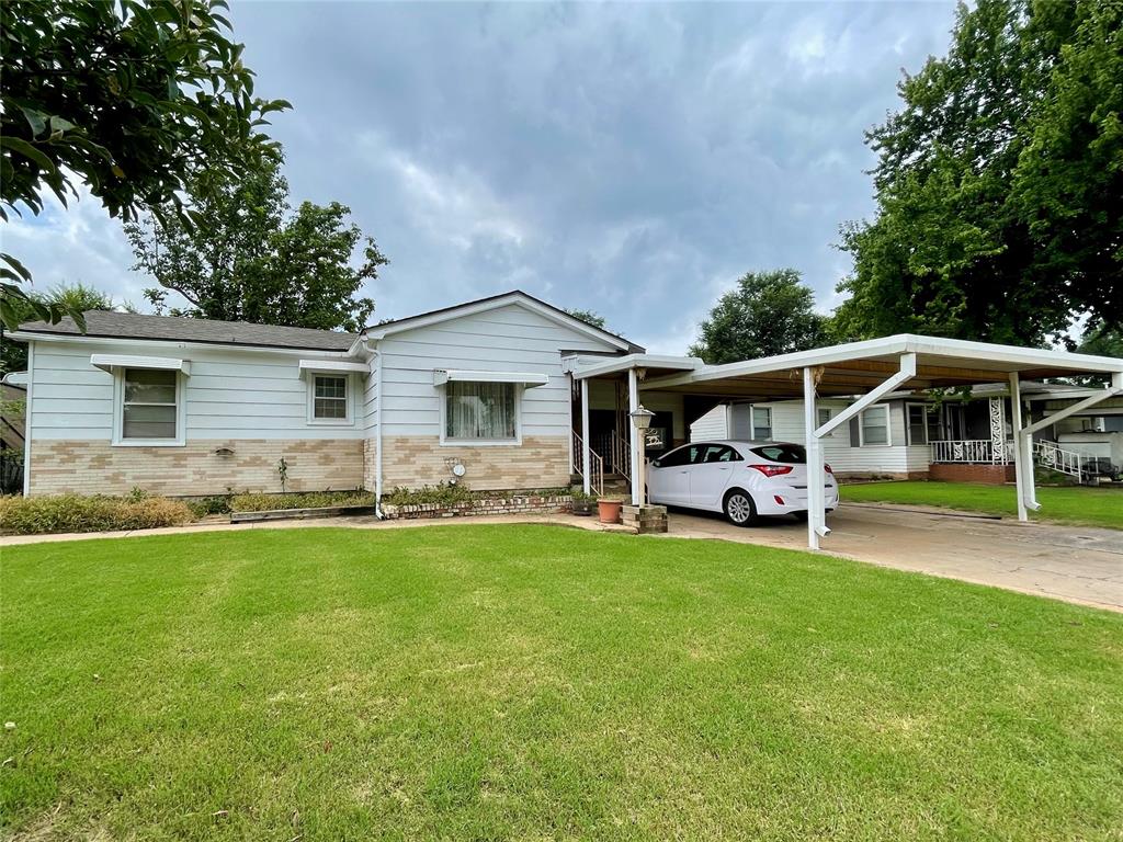 This home has garage enclose which makes a second living area or extra bedroom and a large laundry room with lots of storage and cabinets.  An extra-large country style kitchen with oak cabinets and beautiful wood floors, also a breakfast nook plus a dining room, great for entertaining or large group. Ceiling fans and updated bathrooms.   A must-see home Really nice, with new roof in 2023, air conditioning and heating about a year old and newer hot water heater, large carport and covered patio with extra deck, fresh paint and new dishwasher.  Yard is fenced.  You will love this one! 
Realtor is related to Seller