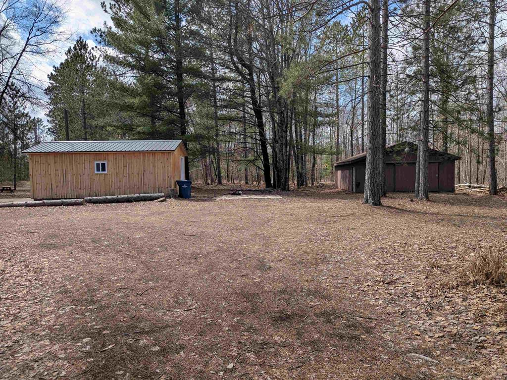 A beautifully wooded 40 acre parcel with State land surrounding located in a nice secluded setting but still close to I-75, M-76, West Branch, etc! This parcel offers fantastic hunting with trails throughout, an elevated blind, new Amish built shed, 24x32 pole barn, and a gate for more secure access. A recreational paradise awaits!