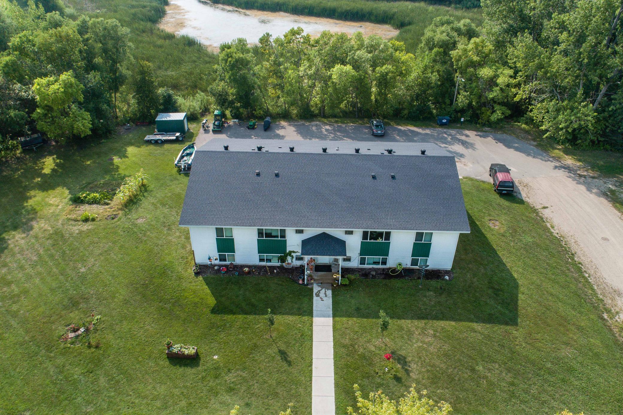 GREAT INVESTMENT OPPORTUNITY!  Eight-plex apartment building on a private, corner lot in Dalton with seven 2 bedroom apartments and one 1 bedroom apartment.  Shared laundry.  Property features off-street parking, low maintenance siding, newer windows, newer AC units, updated flooring in 5 units, each unit has separate electric meter, newer propane water heater, newer lighting and entrance doors, and newer sidewalk and parking lot pavement.